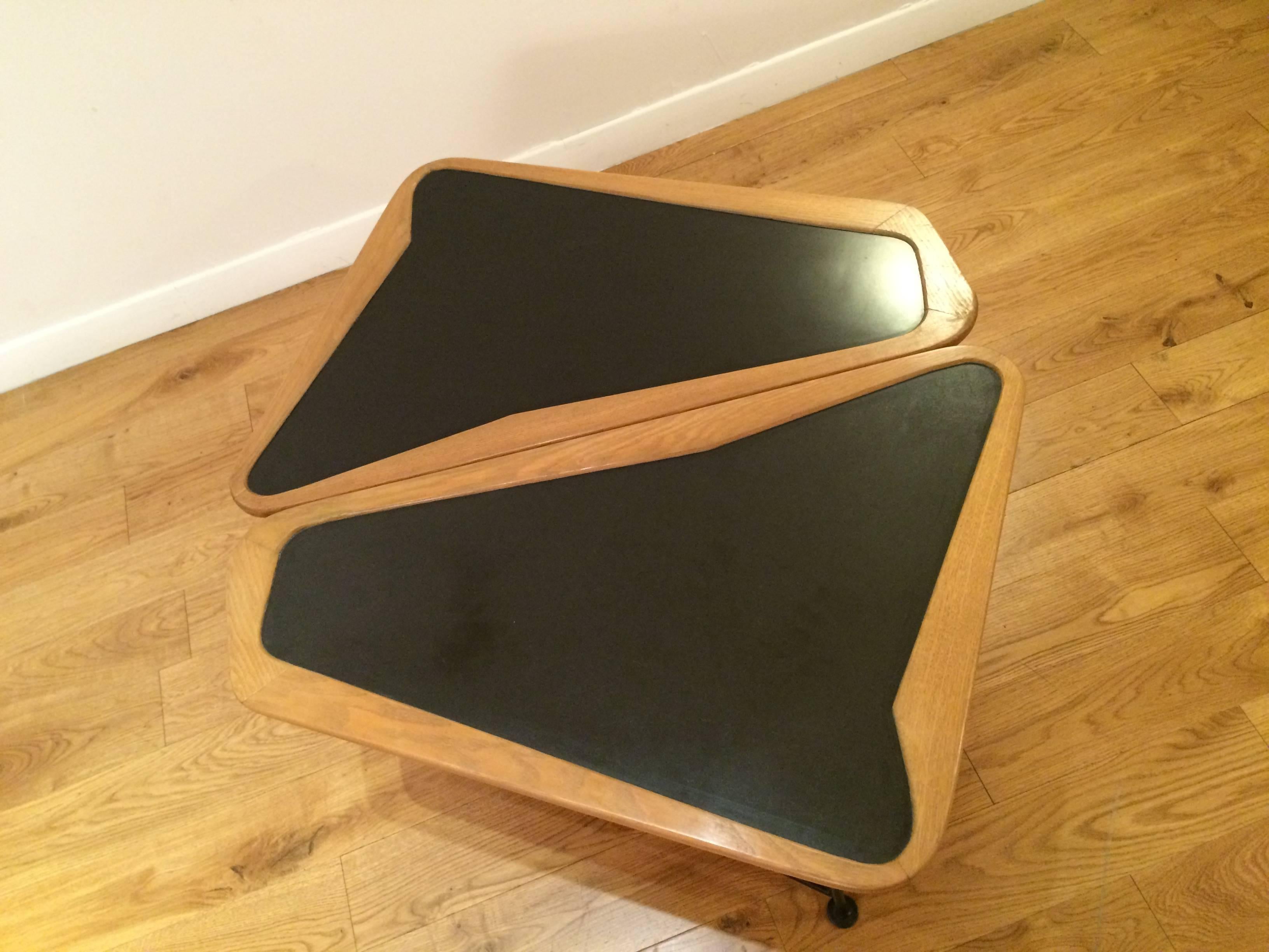 Set of two coffee table made in ash and black formica for the top,
black metal legs, designed by Charles Ramos and edited by Castanaletta in 1955

