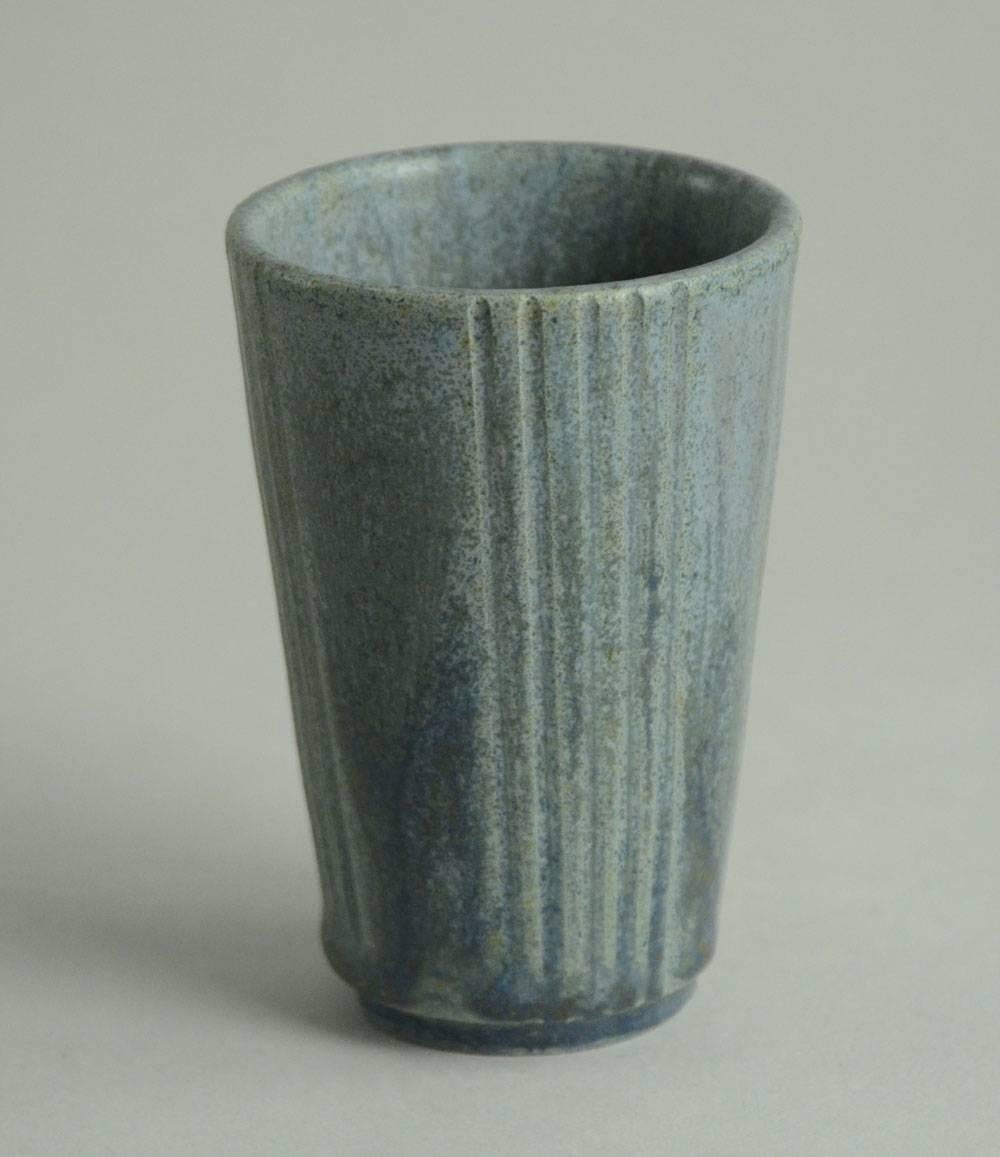 1. Stoneware vase with matte blue glaze.
Height 3/12