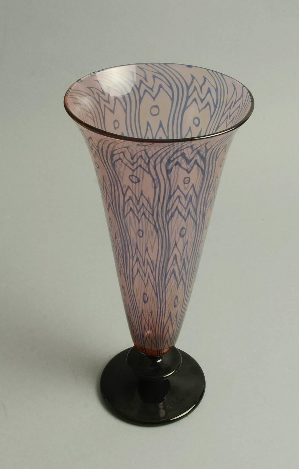 Edward Hald (with Knut Bergqvist) for Orrefors.
Early slip graal chalice form vase in pink and blue glass, 1928.
Engraved 