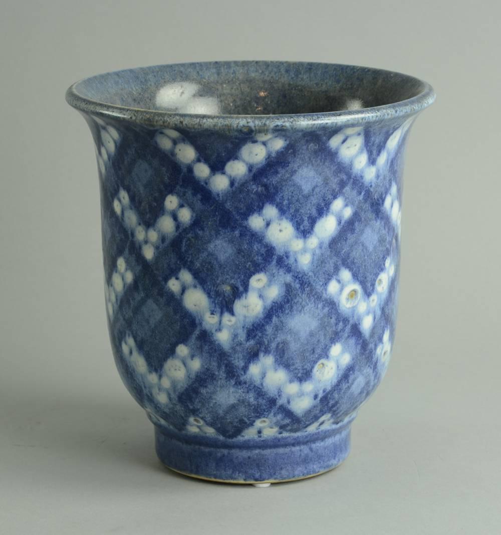Earthenware "faience" vase with glossy glaze in shades of blue and white, 1931.