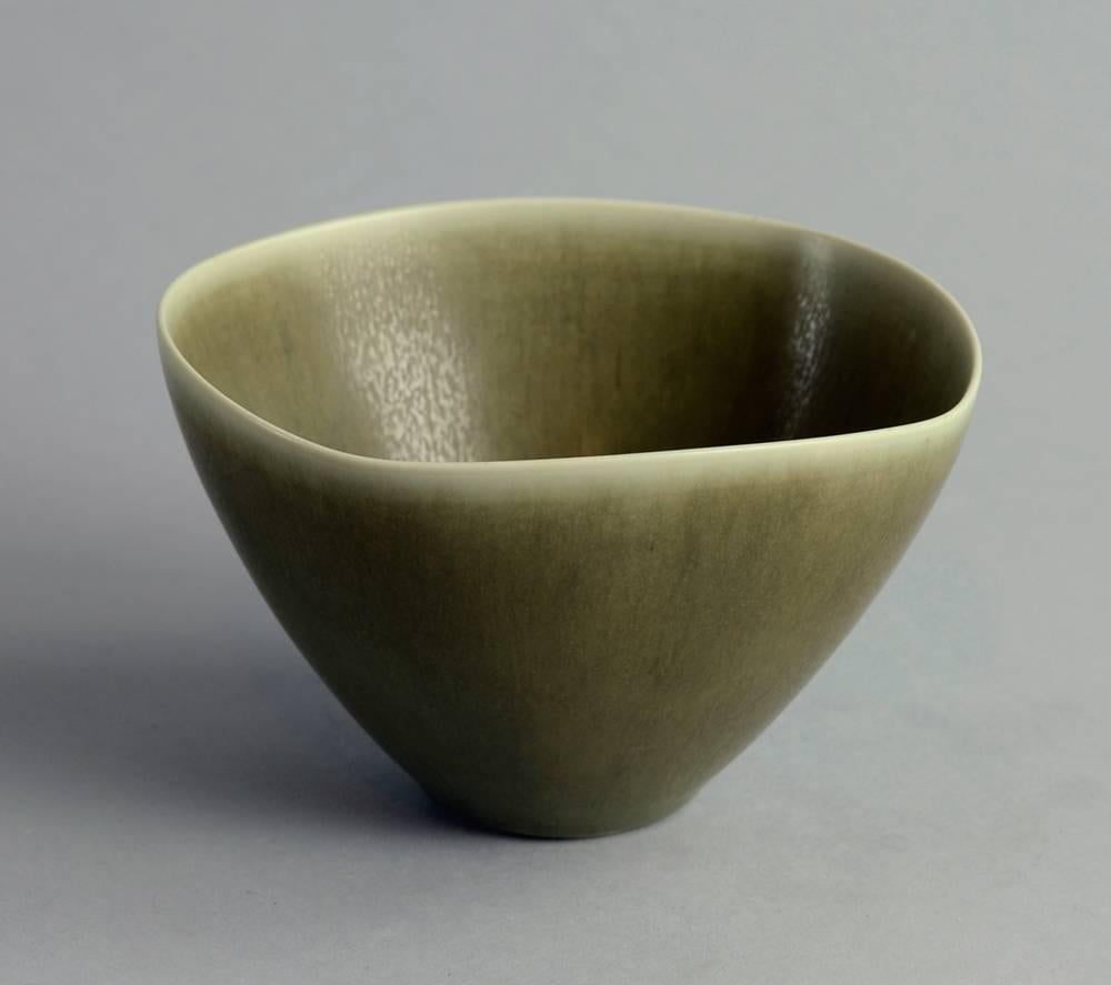 1 Stoneware bowl with squared rim with matte olive brown glaze, 1950s-1960s.
Height 2 3/4