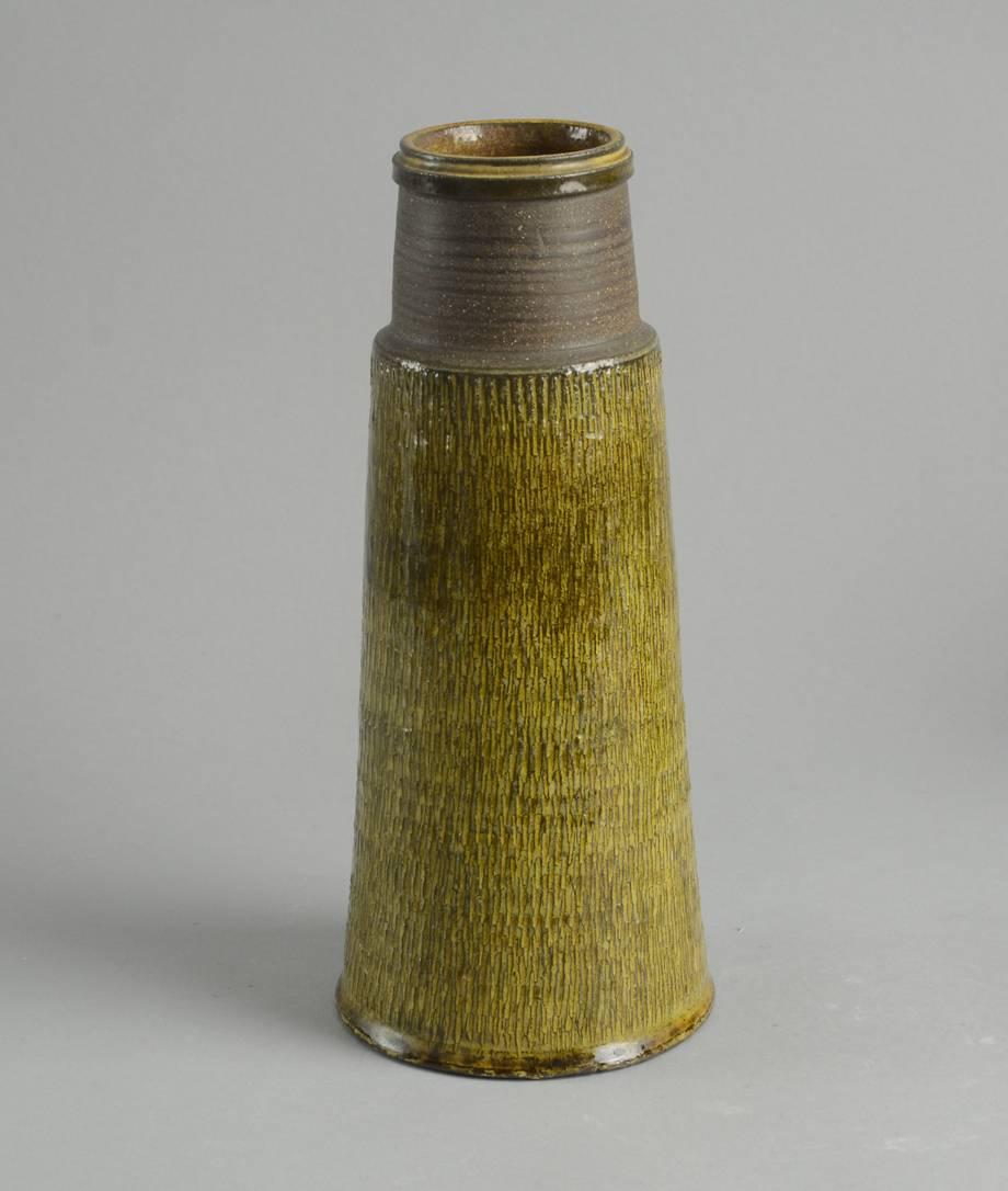 1. Stoneware vase with translucent yellow glaze, 1950s-1960s.
Height: 3 3/4