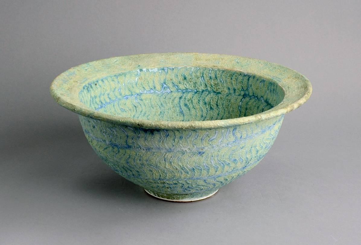 Large unique stoneware bowl with textured surface with matte blue and pale blue-green glaze, 1992.