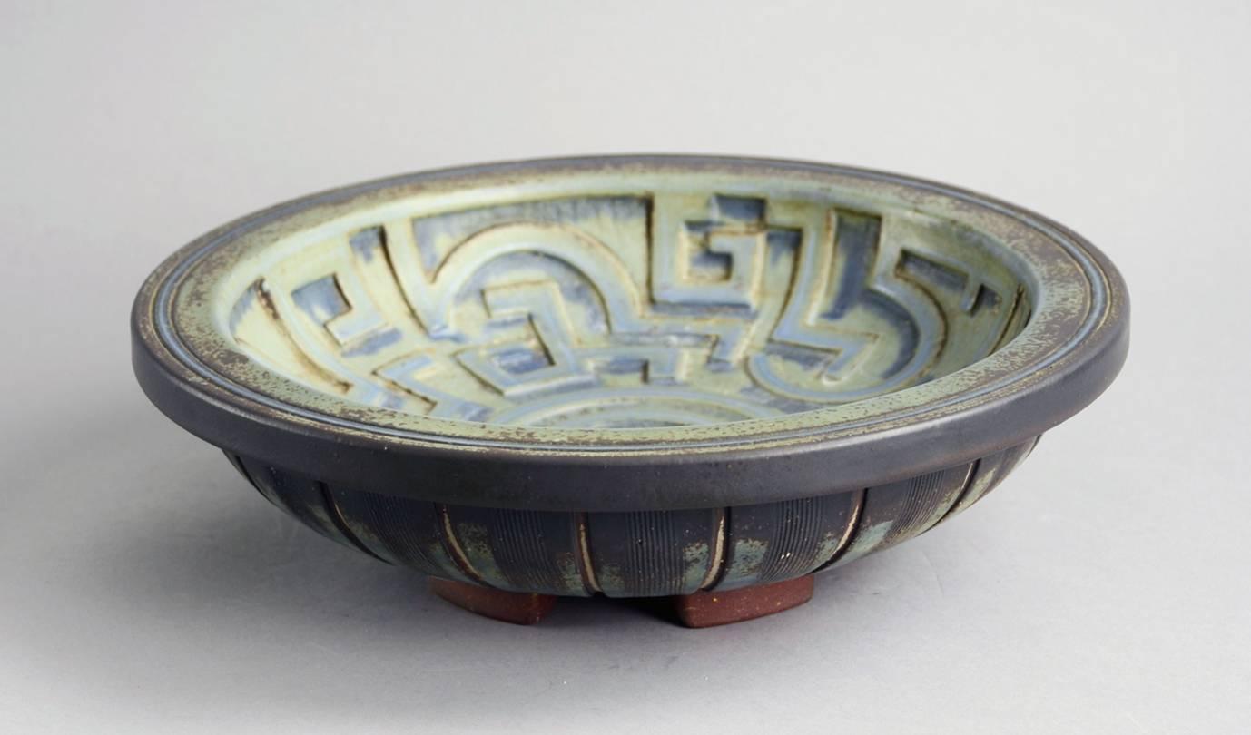 "Farsta" footed bowl with carved pattern to exterior, blue matte glaze, 1956.