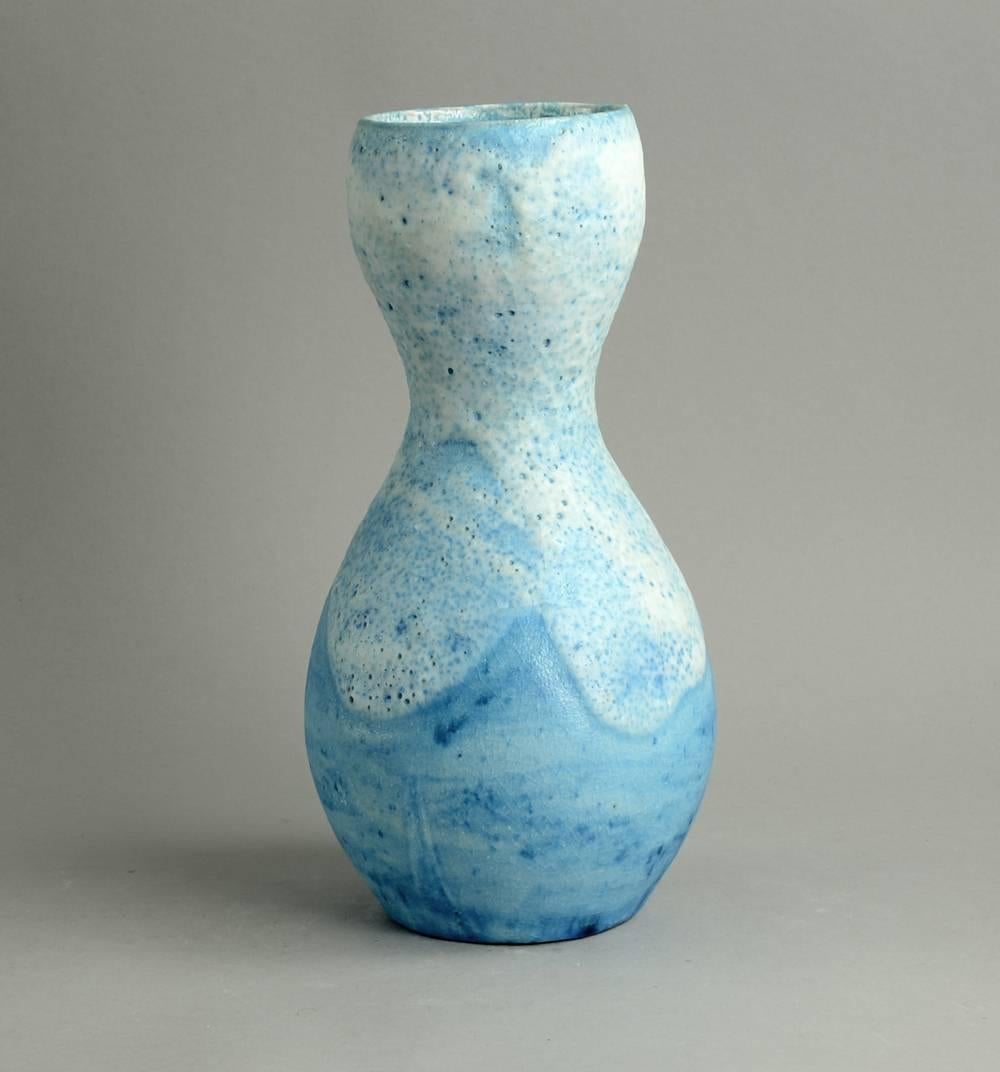 Unique stoneware double gourd vase with matte pitted pale blue and white glaze, by Guido Gambone, Italy, 1950s.
Height 12 3/4" (32.5cm) Width 6 1/2" (16.5cm)
Painted donkey mark, "GAMBONI ITALY" to base.
Excellent undamaged,