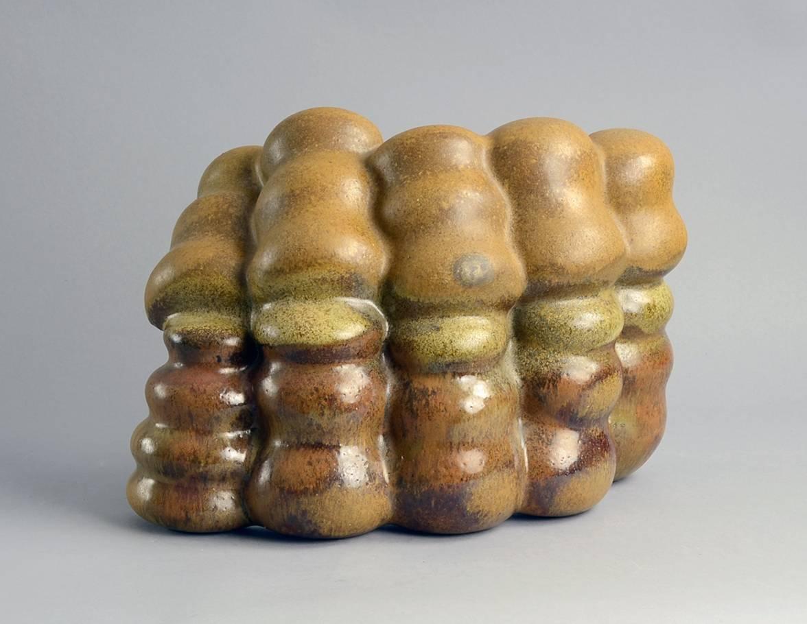 Unique hand built stoneware sculptural form with glossy and matte brown glaze, by Beate Kuhn, own studio, Germany 1970s-1980
Excellent unrestored, undamaged condition. 
Height 9 1/2