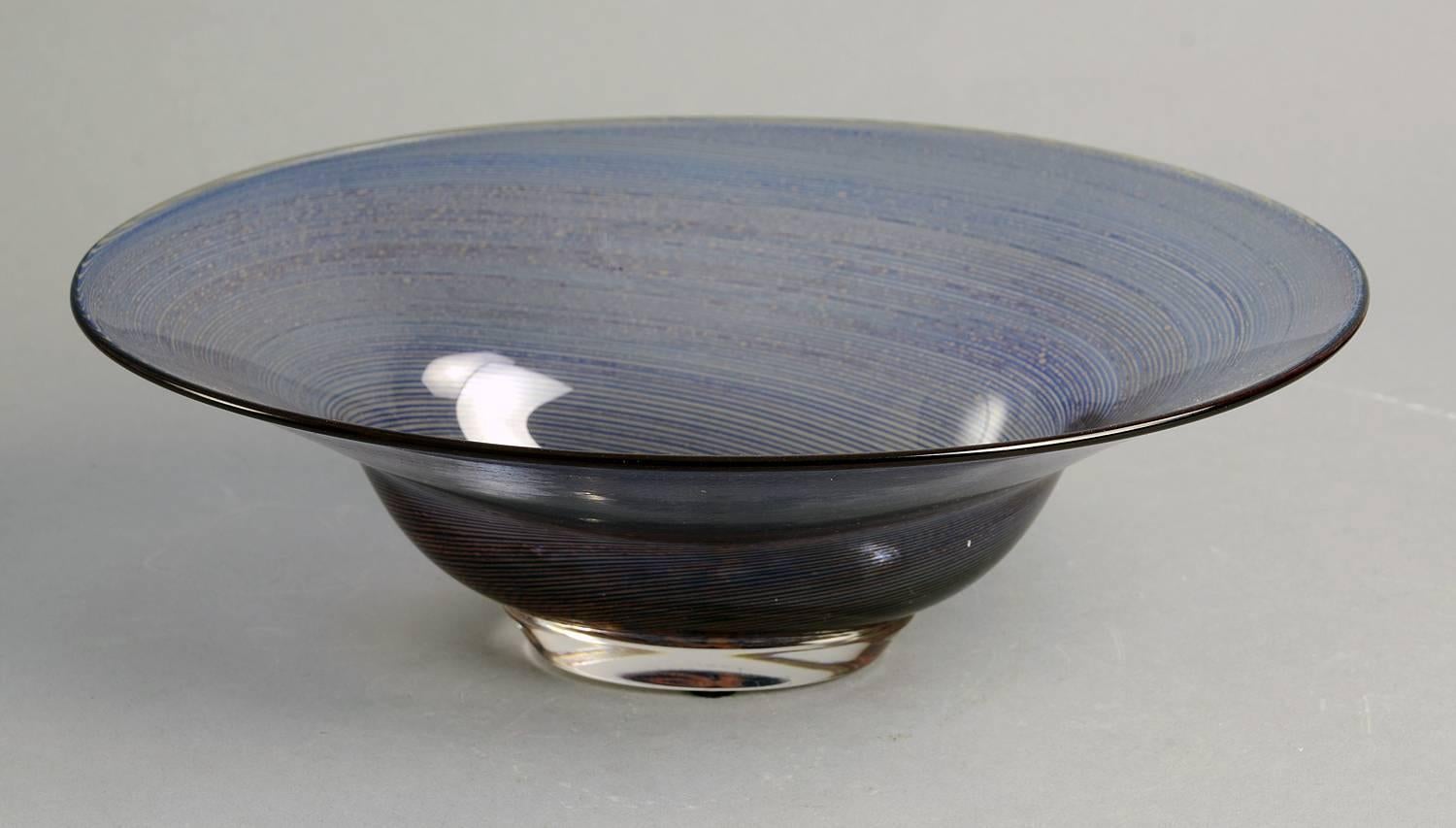 Edward Hald for Orrefors, Sweden. "Aqua graal" footed bowl internally decorated with blue lines and red crushed glass, 1966. Signed and dated.
Engraved "Aqua graal Edward Hald, 1966" to base. 
Height 3 1/4" (8 cm) width 10