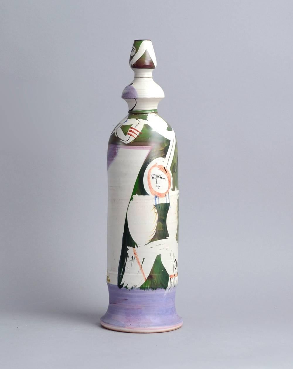 Gilbert Portanier, own studio, France
Unique stoneware vase with hand-painted decoration with matte white, purple, green and brown glaze, 1981.
Measures: Height 15 3/4