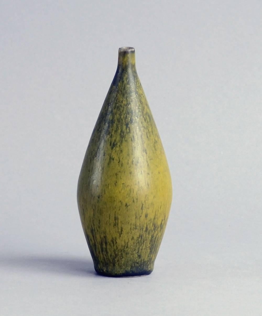Carl Harry Stalhane for Rorstrand, Sweden.
Unique stoneware vase with matte yellow-green solfatara glaze, 1959.
Height 5 3/4