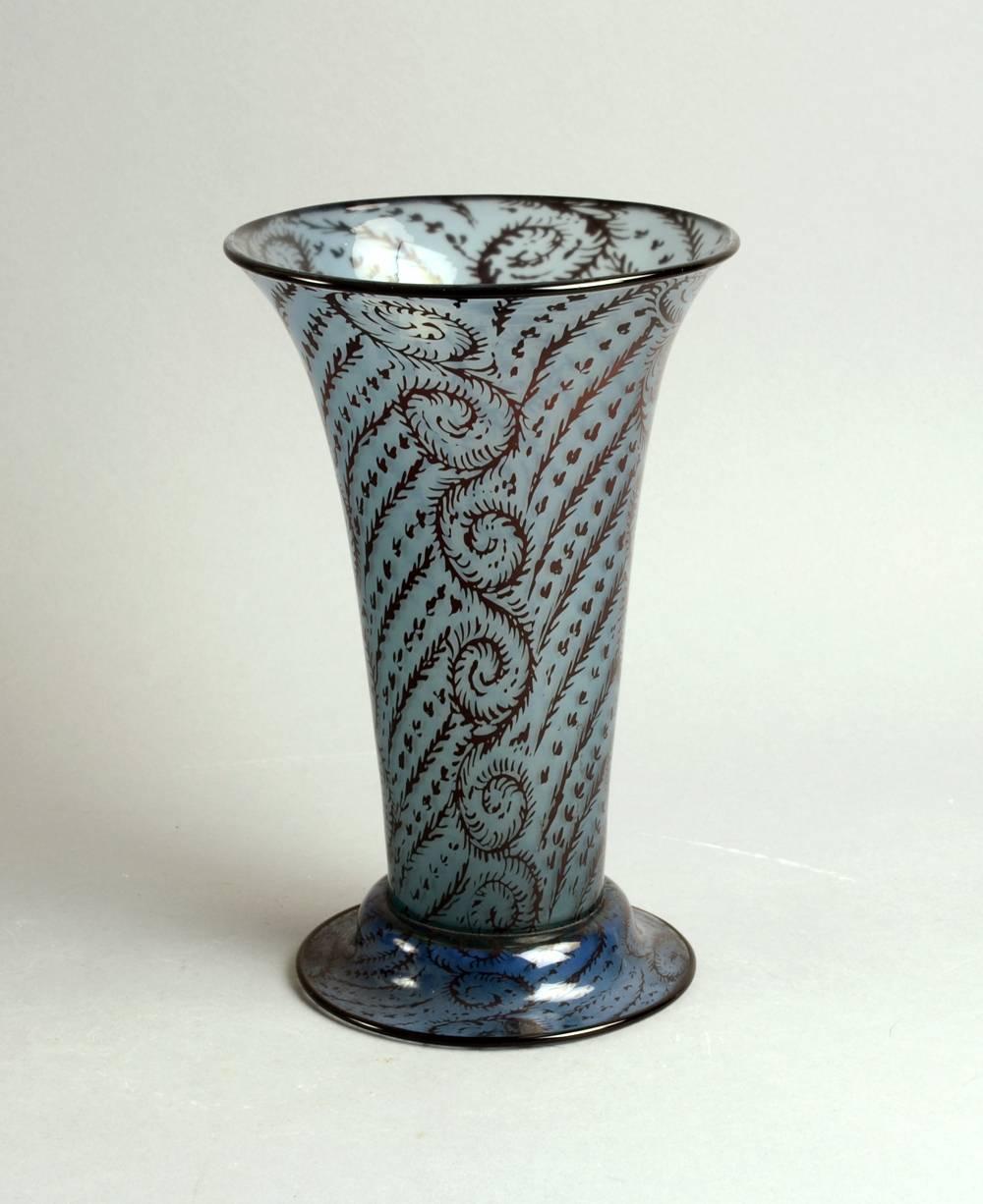 Attributed to Simon Gate or Edward Hald for Orrefors.
Extremely early, experimental "Graal" vase in blue and red glass, circa 1910s-1920s.
Engraved "Orrefors 23"
Excellent condition, no chips, cracks or repairs.
 