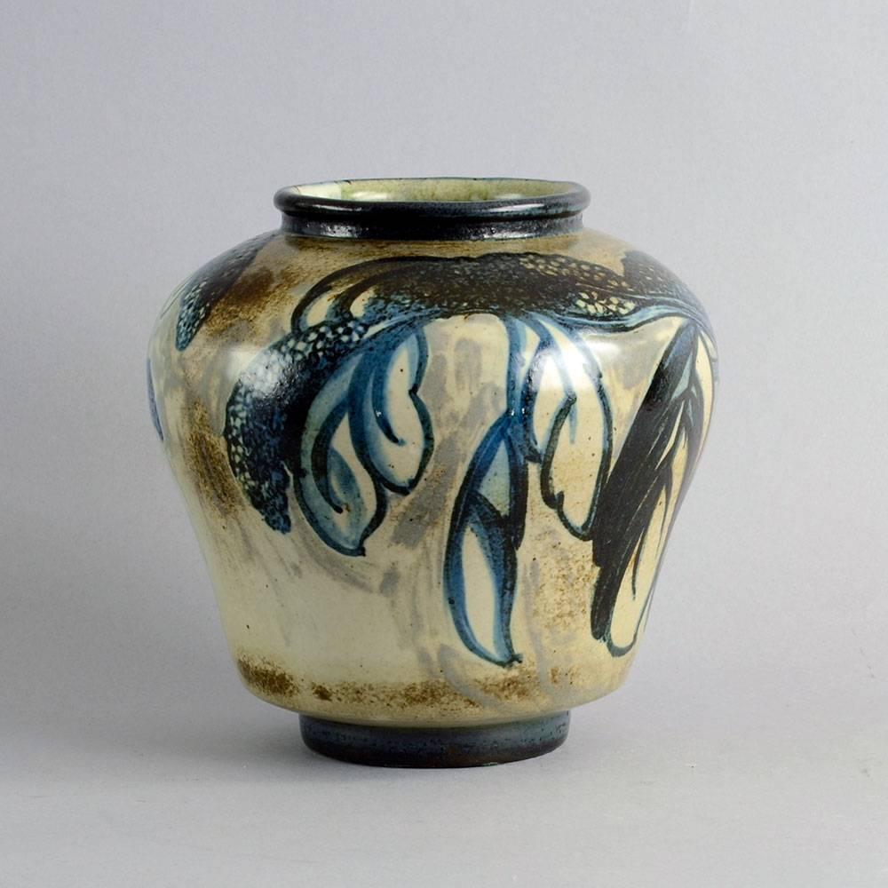 Cathinka Olsen for Bing and Grondahl, Denmark
Unique stoneware vase with hand-painted leaf decoration with matte brown, beige and blue glaze, 1910-1930.
Measures: Height 8 1/4