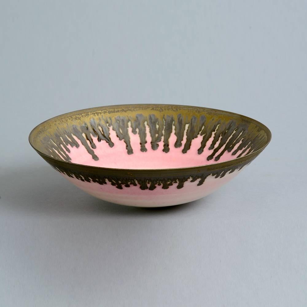 Peter Wills, own studio, UK more

Unique porcelain bowl with glossy pink and matte metallic brown glaze.
Measures: Height 2 1/4