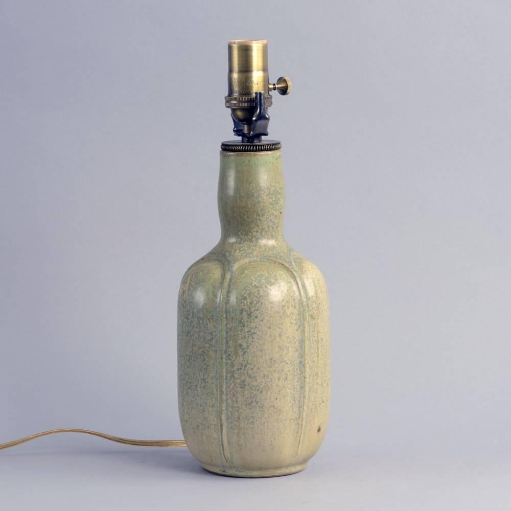 Arne Bang, own studio, Denmark

Stoneware lamp with matte olive and beige crystalline glaze, 1930s-1940s.
Height 13 3/4