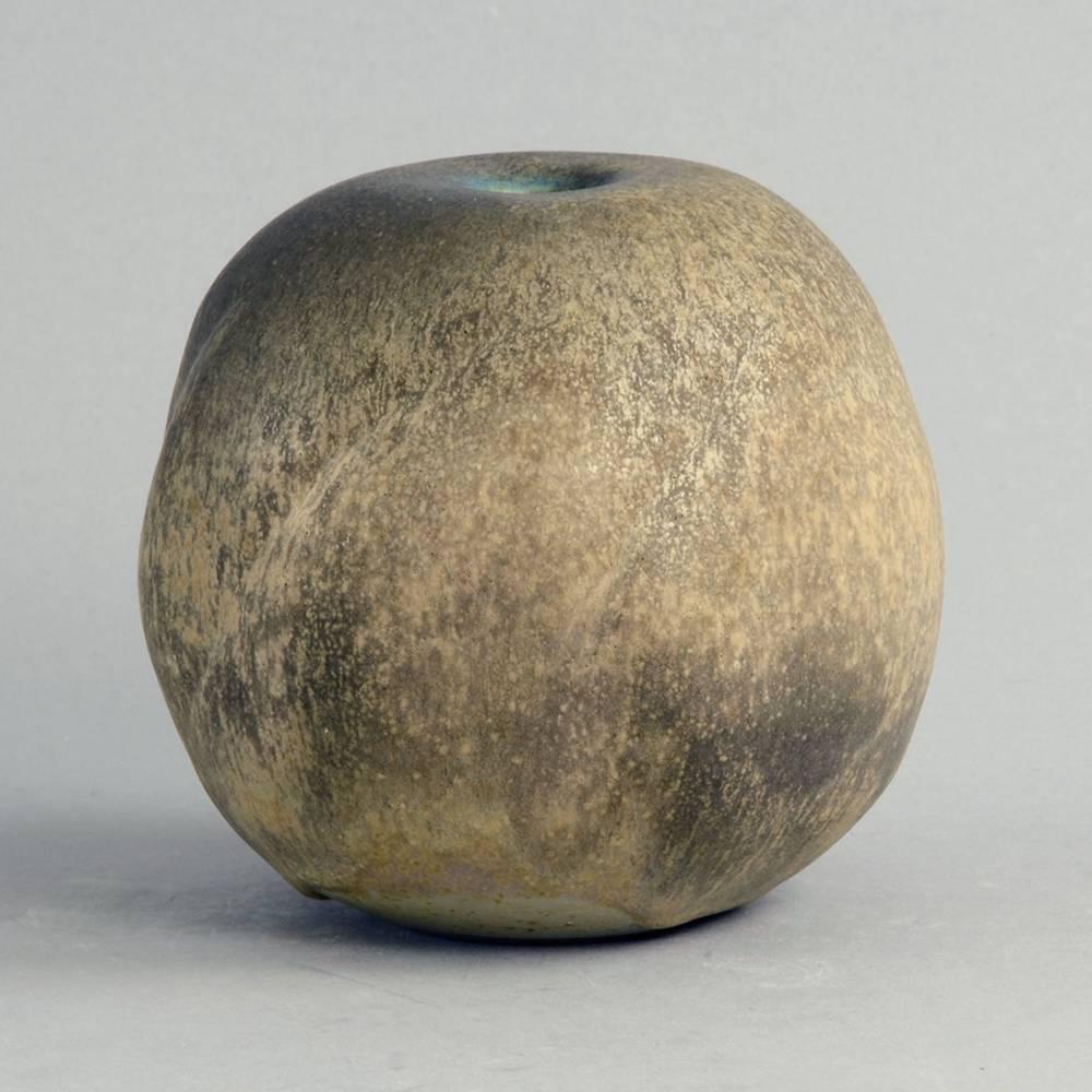 Horst Kerstan, own studio, Germany

Unique stoneware vase with matte pale brown glaze, 1999.
Measures: Height 4 3/4
