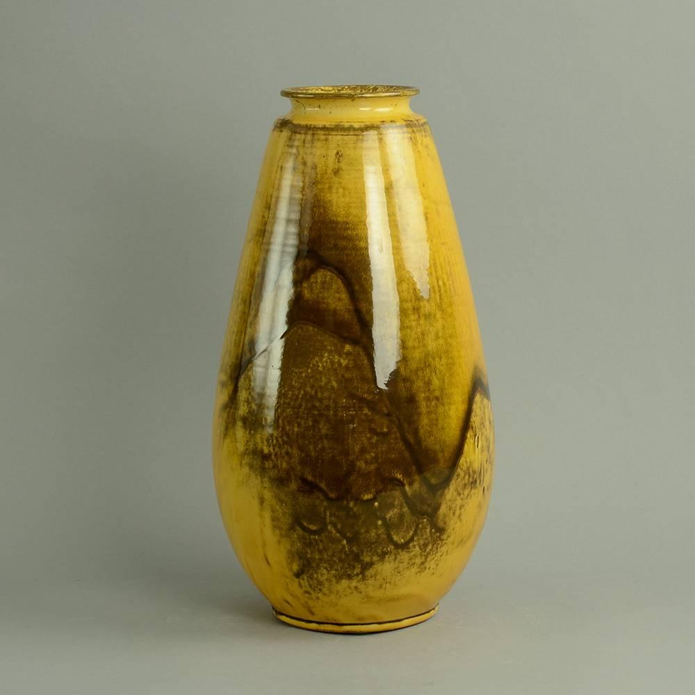 Svend Hammershøi for Herman A. Kahler Keramik, Denmark

Earthenware vase with yellow and brown glossy glaze, 1930s
Measures: Height 15 1/4