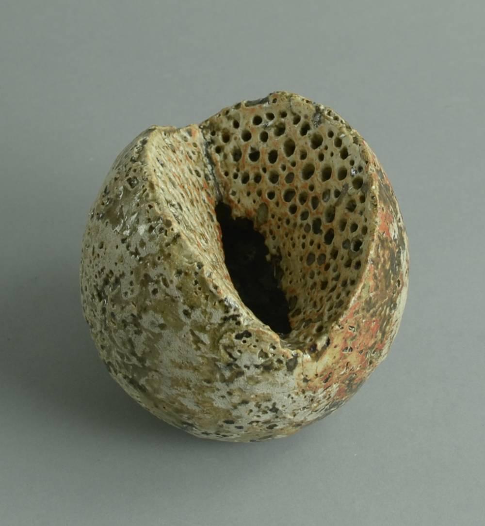 Alan Wallwork, Own Studio, UK

Unique stoneware sculptural form with matte pale grey, charcoal and rust colored glaze.
Measure: Height 4 1/4