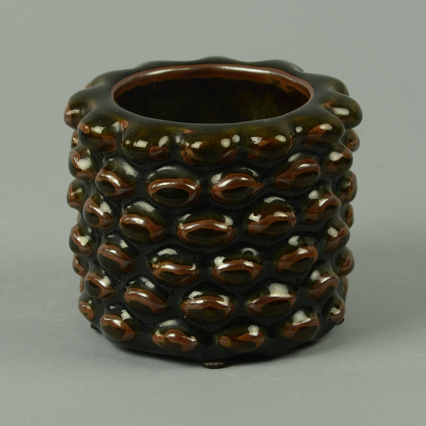 Axel Salto for Royal Copenhagen, Denmark

Stoneware budding vase with tenmoku glaze in glossy black and matte reddish brown, 1937.
Measure: Height 3 1/2