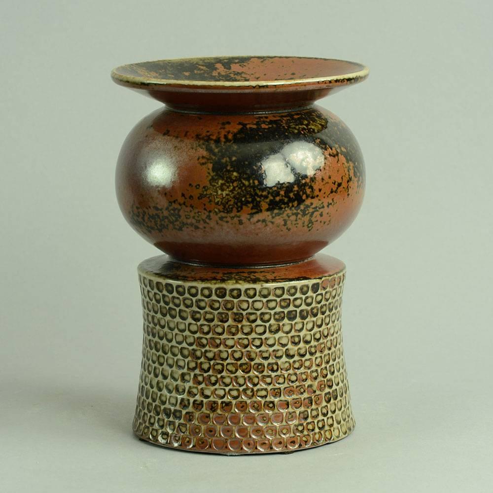 Stig Lindberg for Gustavsberg

Unique stoneware vase with impressed pattern to body and tenmoku (black and brown) glaze, 1963.
Height 8