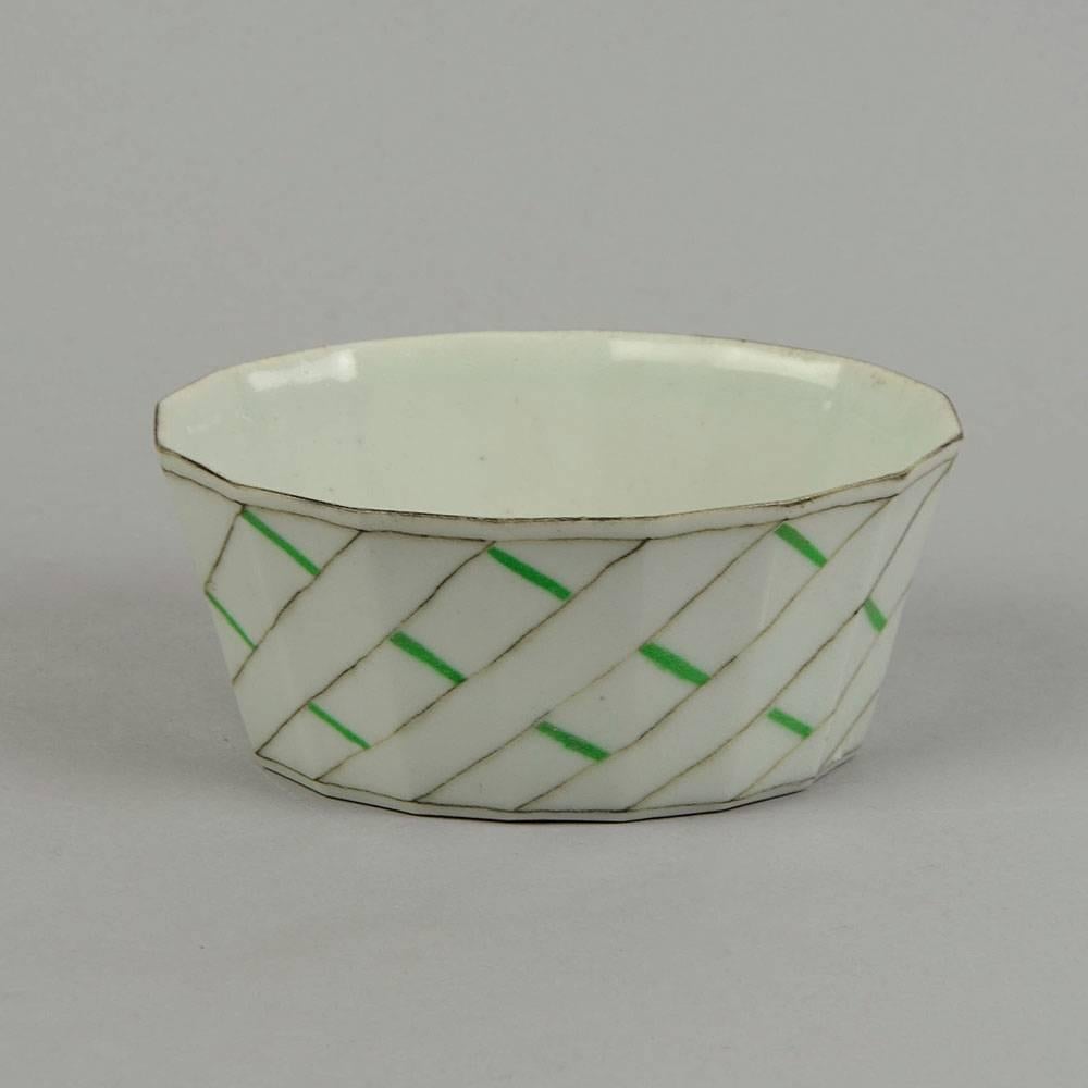 Bodil Manz, own studio, Denmark 

Porcelain bowl with hand-painted brown and green pattern over white glossy glaze.
Measure: Height 2 1/2