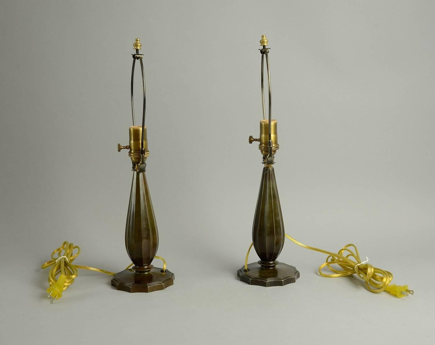 Pair of lamps in disko metal, rewired for US with antique brass fittings, clear plastic wire and plug.