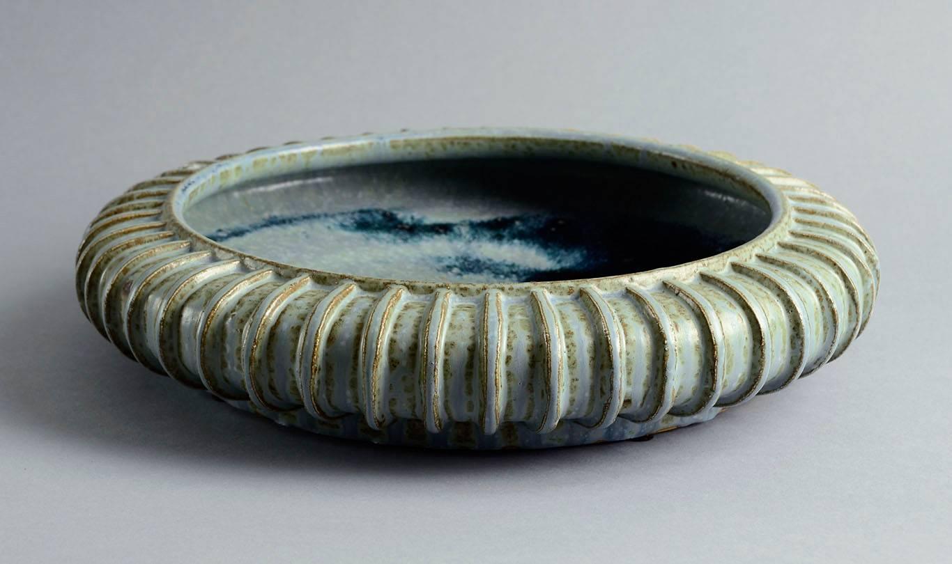 Large stoneware bowl with semi-matte pale green, brown and blue glaze, 1930s-1940s.