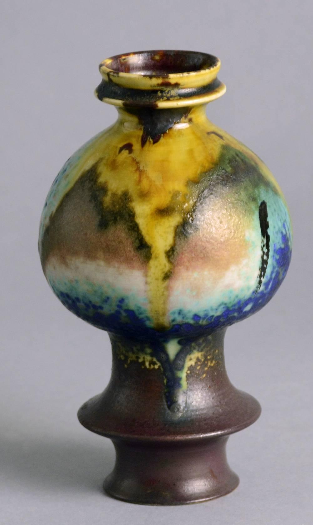 1.  Unique stoneware vase with brown, yellow and turquoise gloss and semi-matte glazes, 1950s-60s.
Height 6 1/4