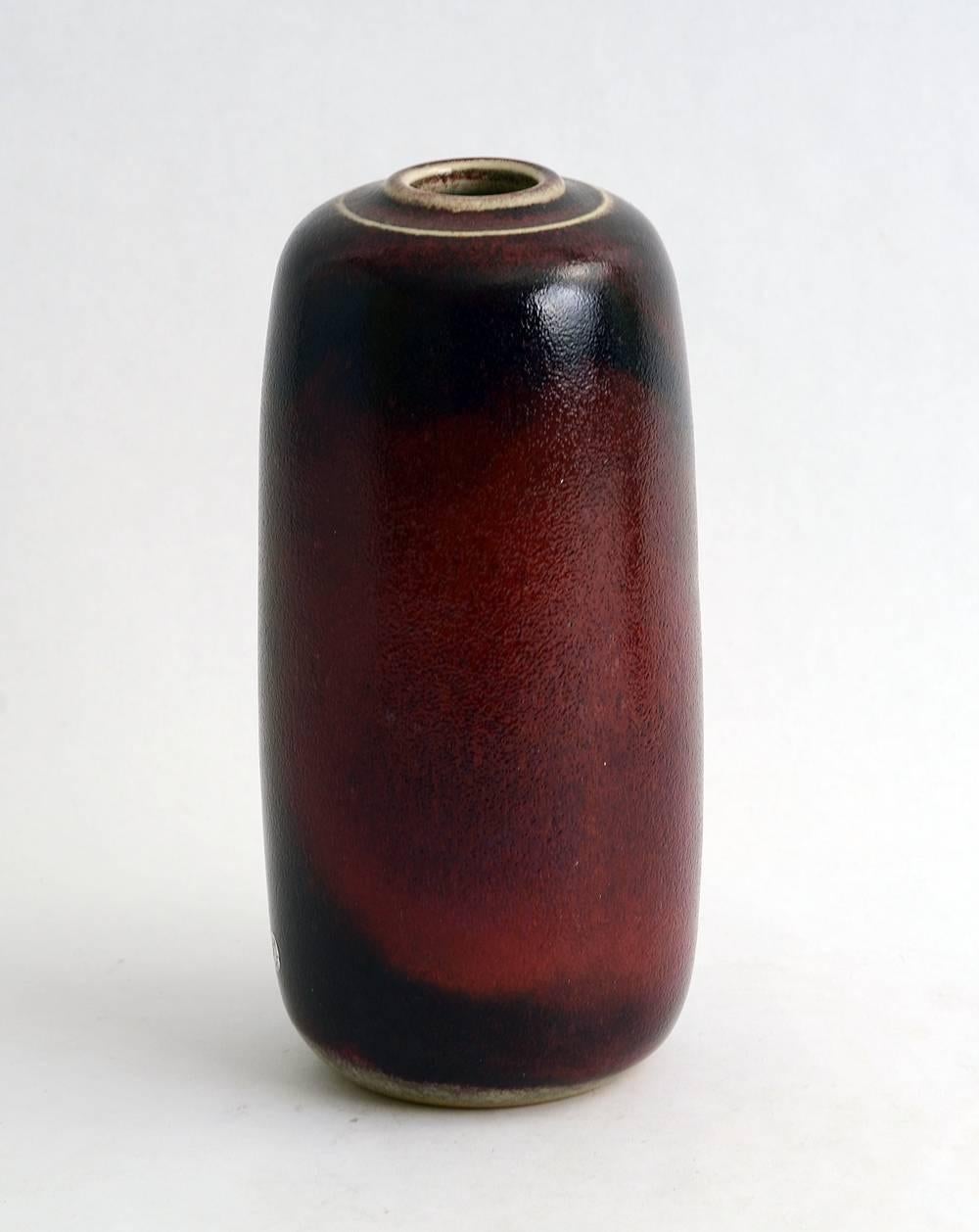 Mid-Century Modern Three Vases with Oxblood Glaze by Edouard Chapallaz For Sale