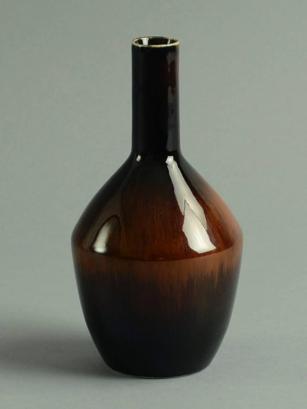 1. Stoneware vase with glossy red-brown and black glaze, 1950s-60s.
Height 6 1/4" (16cm) Width 3 1/2" (9cm) No. A1427
2. Stoneware vase with glossy red-brown and black glaze, 1950s-60s.
Height 4" (10cm) Width 2" (5cm) No.