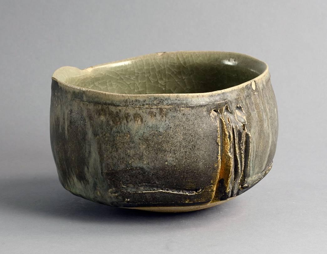 Unique stoneware bowl with semi-gloss charcoal, gray-green and brown glaze, 1970s-1980s.