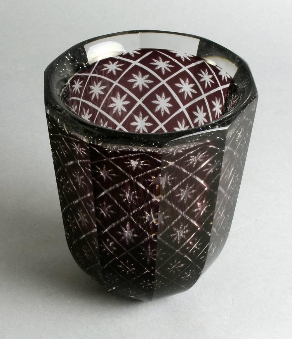 "Graal" vase red glass cased in clear, internally decorated with tiny control bubbles, and with faceted surface, 1938.