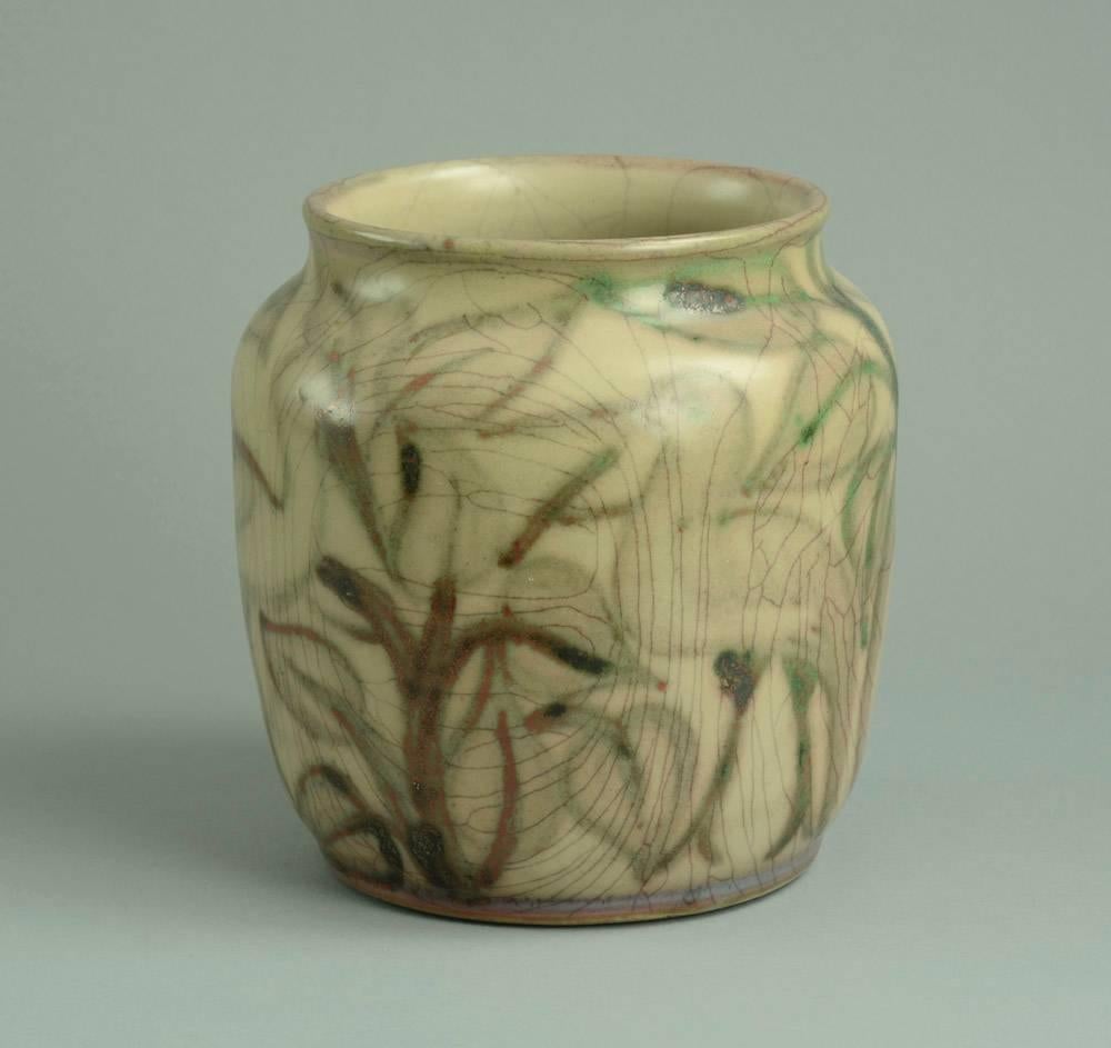 Stoneware vase with hand-painted underglaze illustration of stylized storks, in pick an green with crackle glaze.