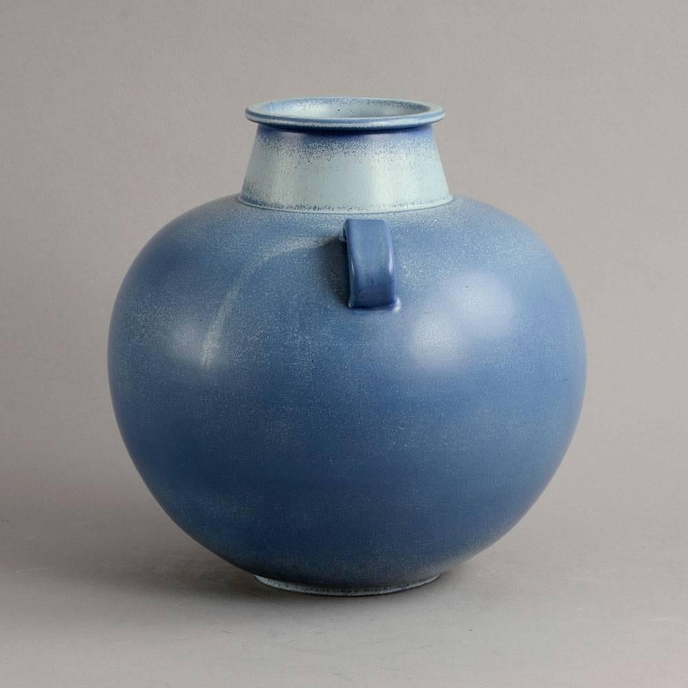 Gunnar Nylund for Rörstrand, Sweden, 1940s-1950s

1. Large stoneware handled vase with matte blue glaze.
Measures: Height 9 1/2