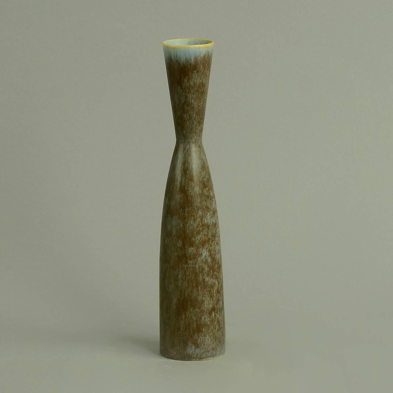 Gunnar Nylund and Carl Harry Stålhane for Rorstrand, Sweden 

1. Stoneware vase with blue and brown matte haresfur glaze by Carl Harry Stalhane, 1950s-1960s.
Measures: Height 8 3/4" (22.5cm), width 1 3/4" (4.5cm) 
Incised "R (three