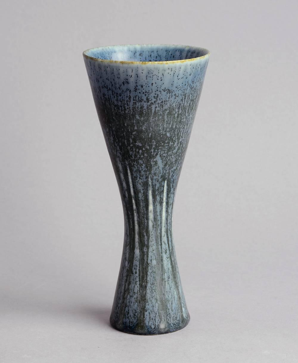 Carl Harry Stalhane for Rorstrand 

1.Stoneware vase with matte blue crystalline glaze.
Measures: Height 7 1/4