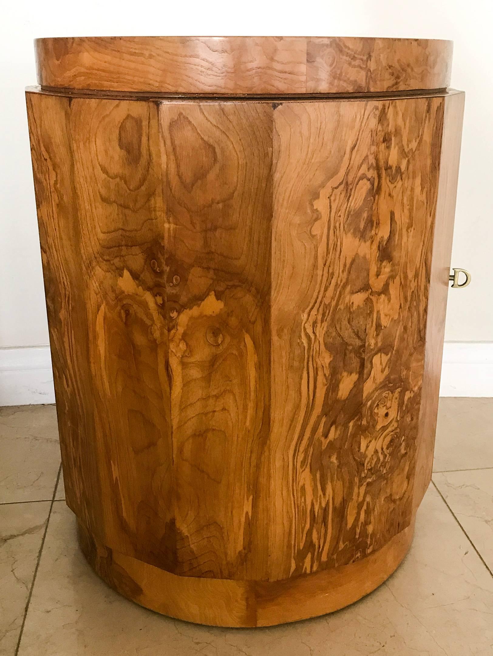 A stunning design by Edward Wormley for Dunbar; this bar could be used as a side table, nightstand or accent piece in any contemporary environment. The piece is crafted from burl wood and features its original 