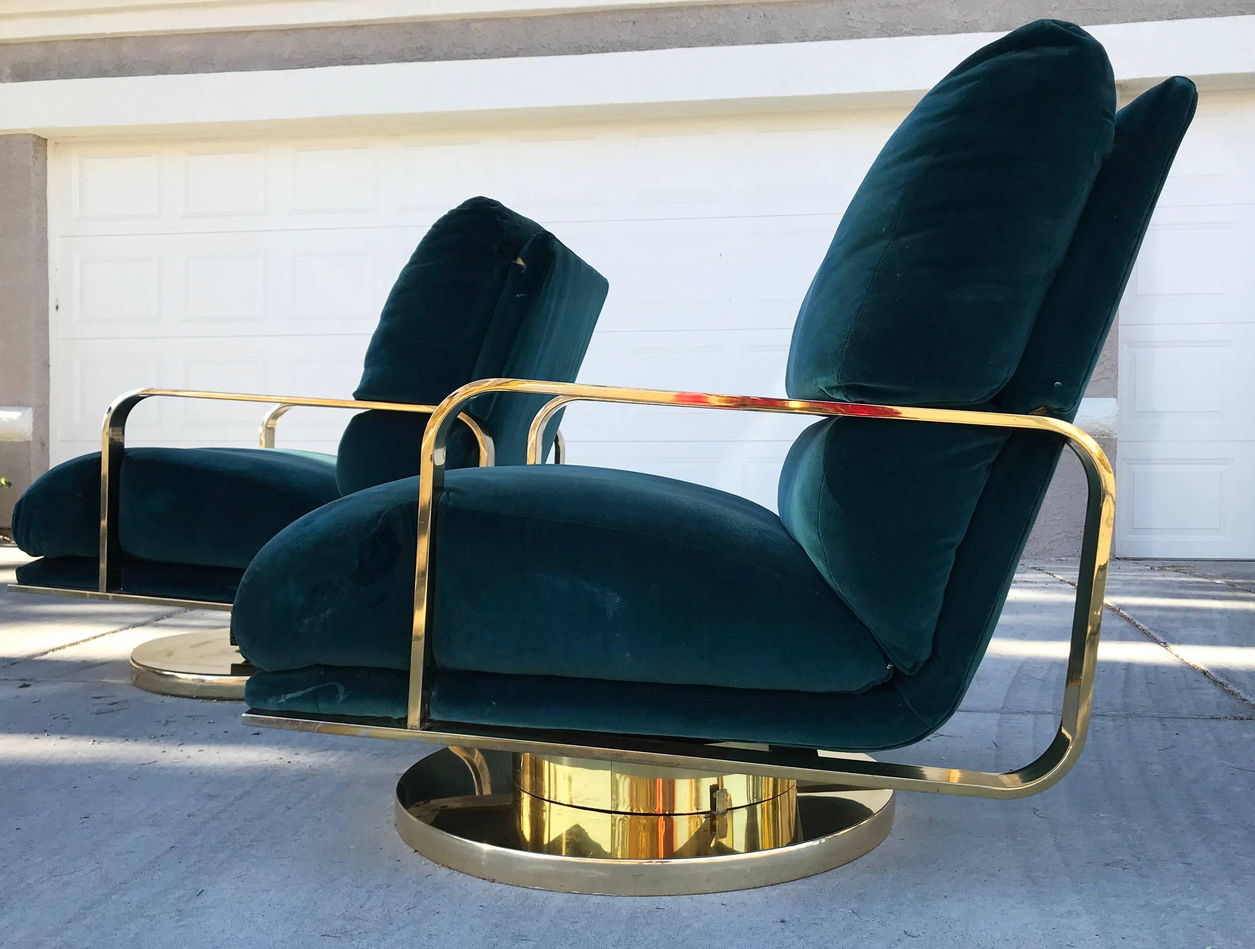 Right now we have an incredible find a pair of Milo Baughman brass base, swivel and rocking lounge chairs. These chairs were created alongside their matching chaise longue counterparts (with same base) and are incredibly hard to find. This set is in