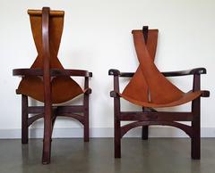 Pair of Three-Legged Arts and Crafts Slung Leather Lounge Chairs