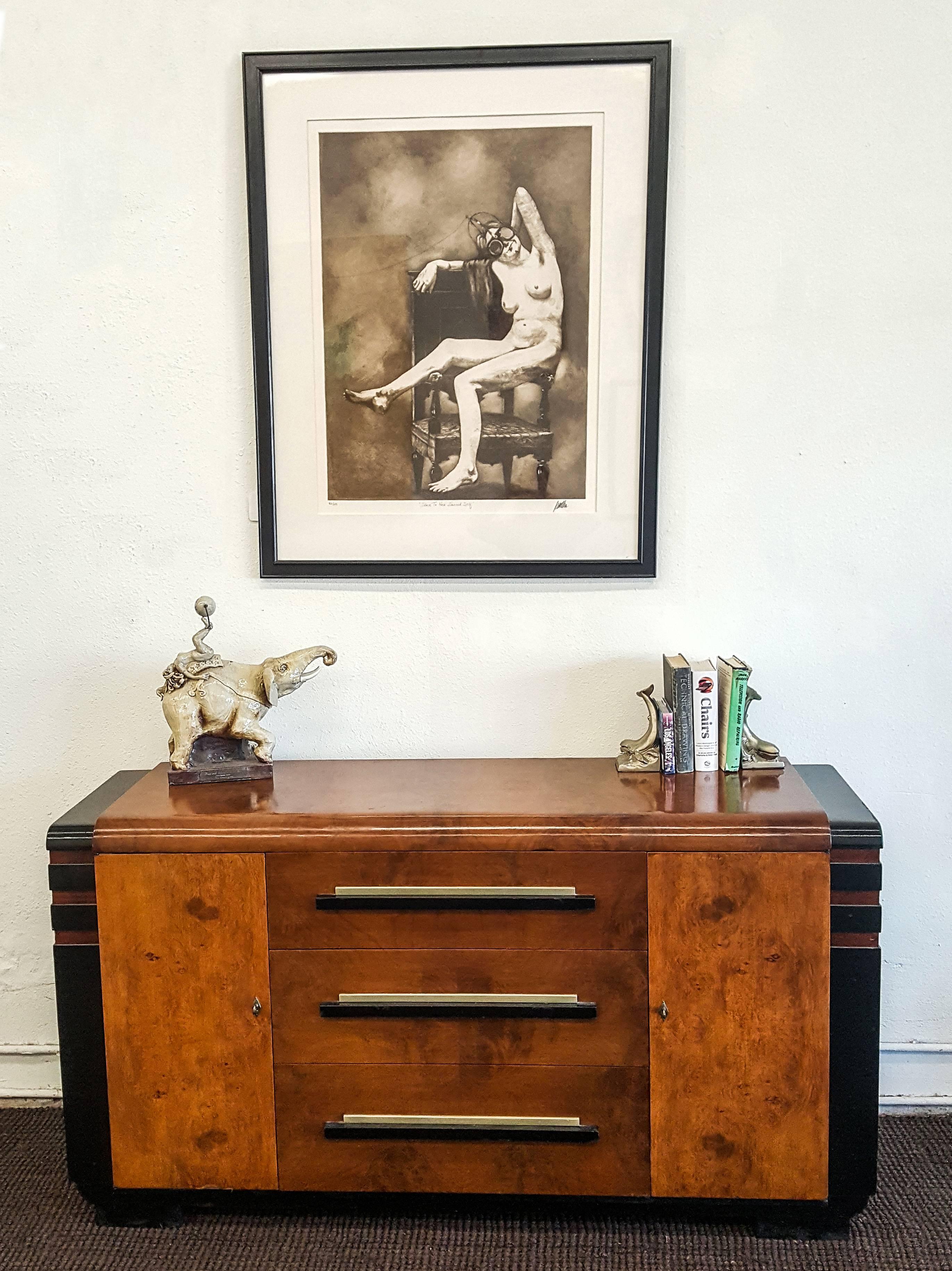 This piece is stunning. An original Donald Deskey buffet for Hastings Table Company. Donald Deskey (American 1894-1989) was one of America's premier modernist designers, creating the interiors of Radio City Music Hall, as well as packaging for such
