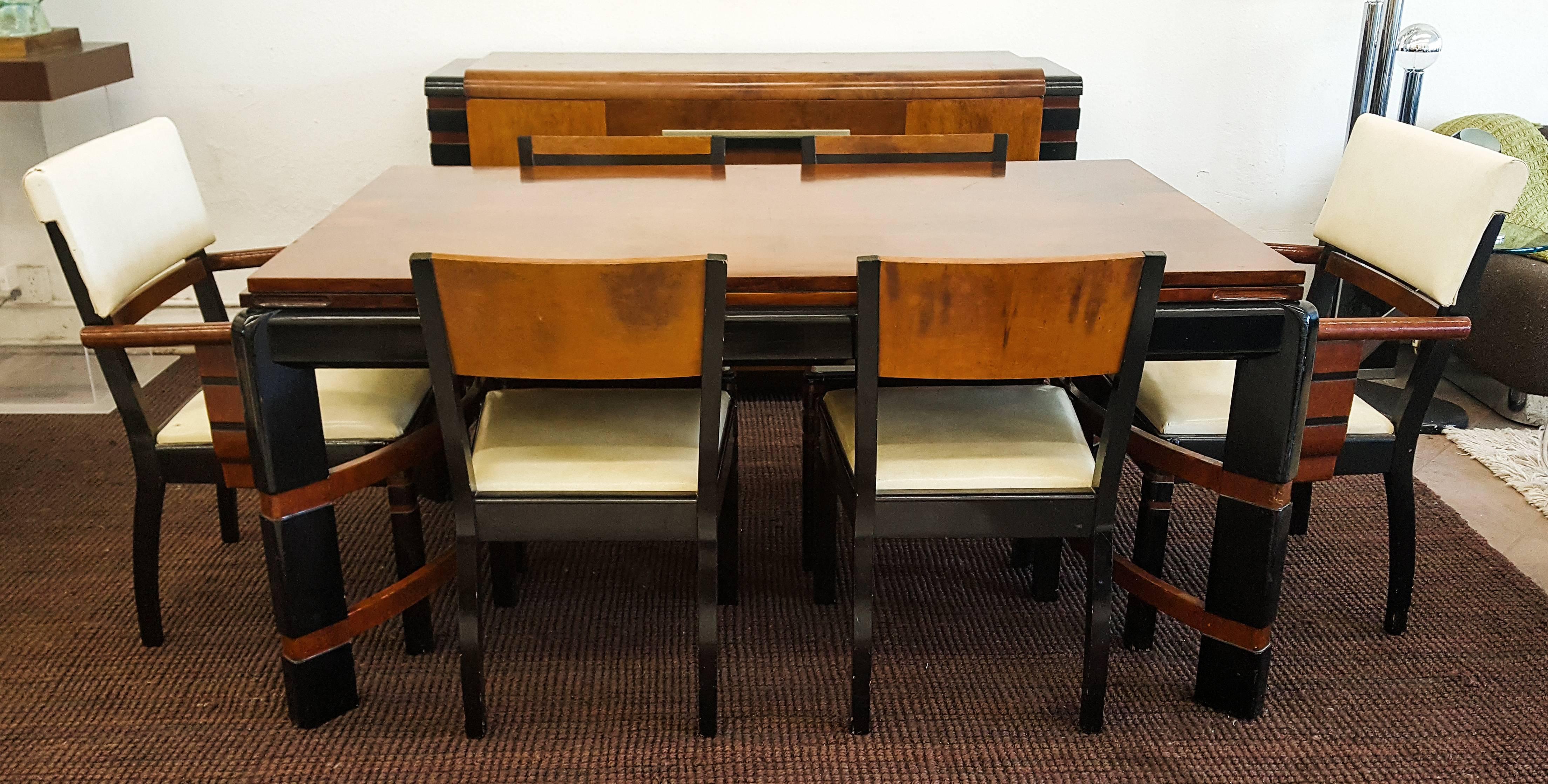 A stunning dining set with by Donald Deskey (American 1894-1989). Deskey was one of America's premier modernist designers, creating the interiors of Radio City Music Hall, as well as packaging for such everyday items as the Crest toothpaste tube. He