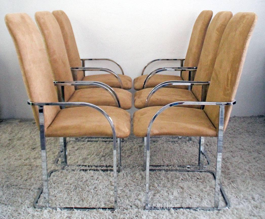 Gorgeous Milo Baughman dining chairs for DIA. The chairs are in incredible condition and have just Gotten back from being reupholstered in a tan microsuede material.