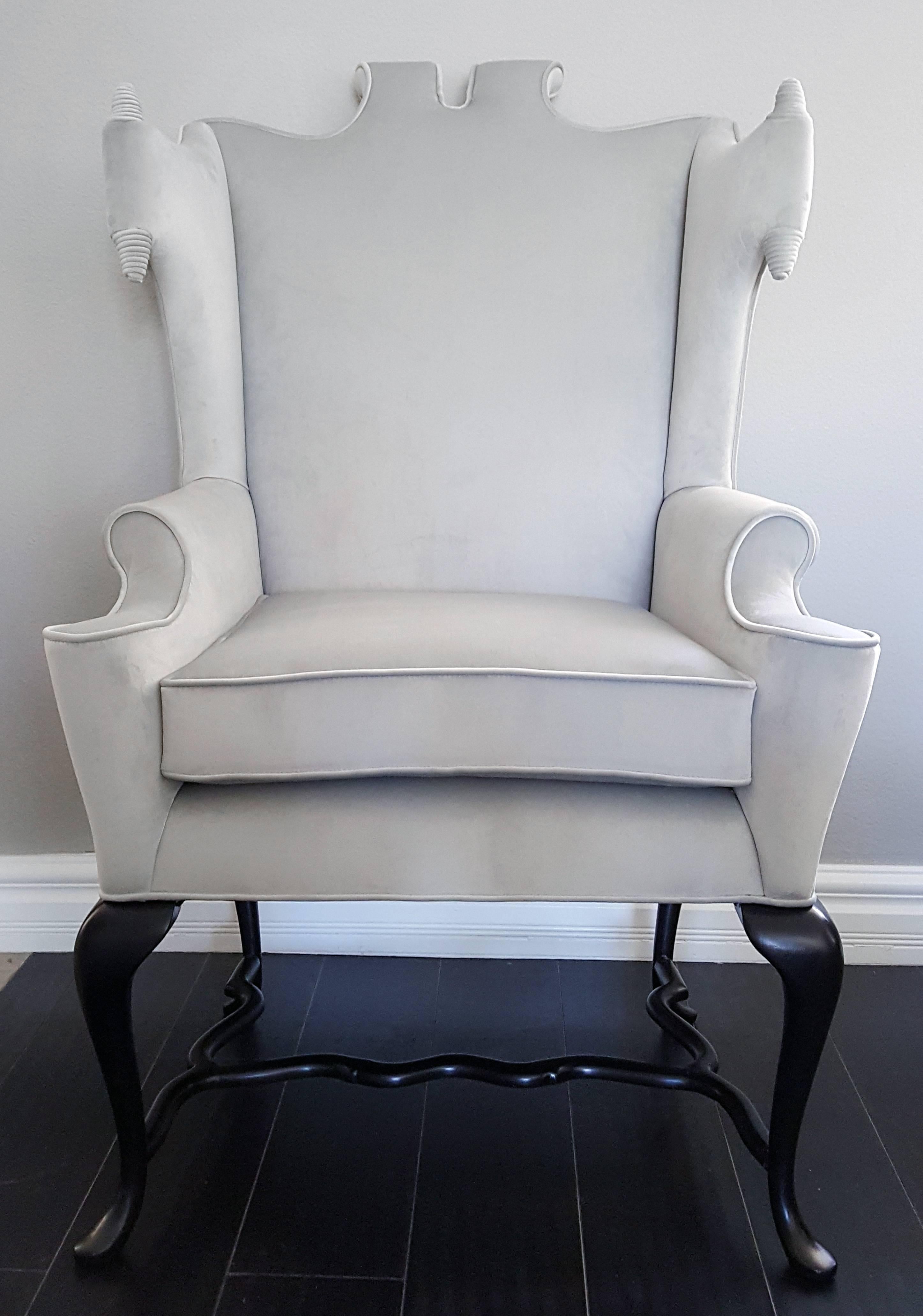 A stunning example of design at its finest, an incredibly rare Arturo Pani wingback chair, fully restored and upholstered in a fine, low-pile, dove grey velvet. This chair was documented in Verna Cook Shipway and Warren Shipway's book: "Mexican