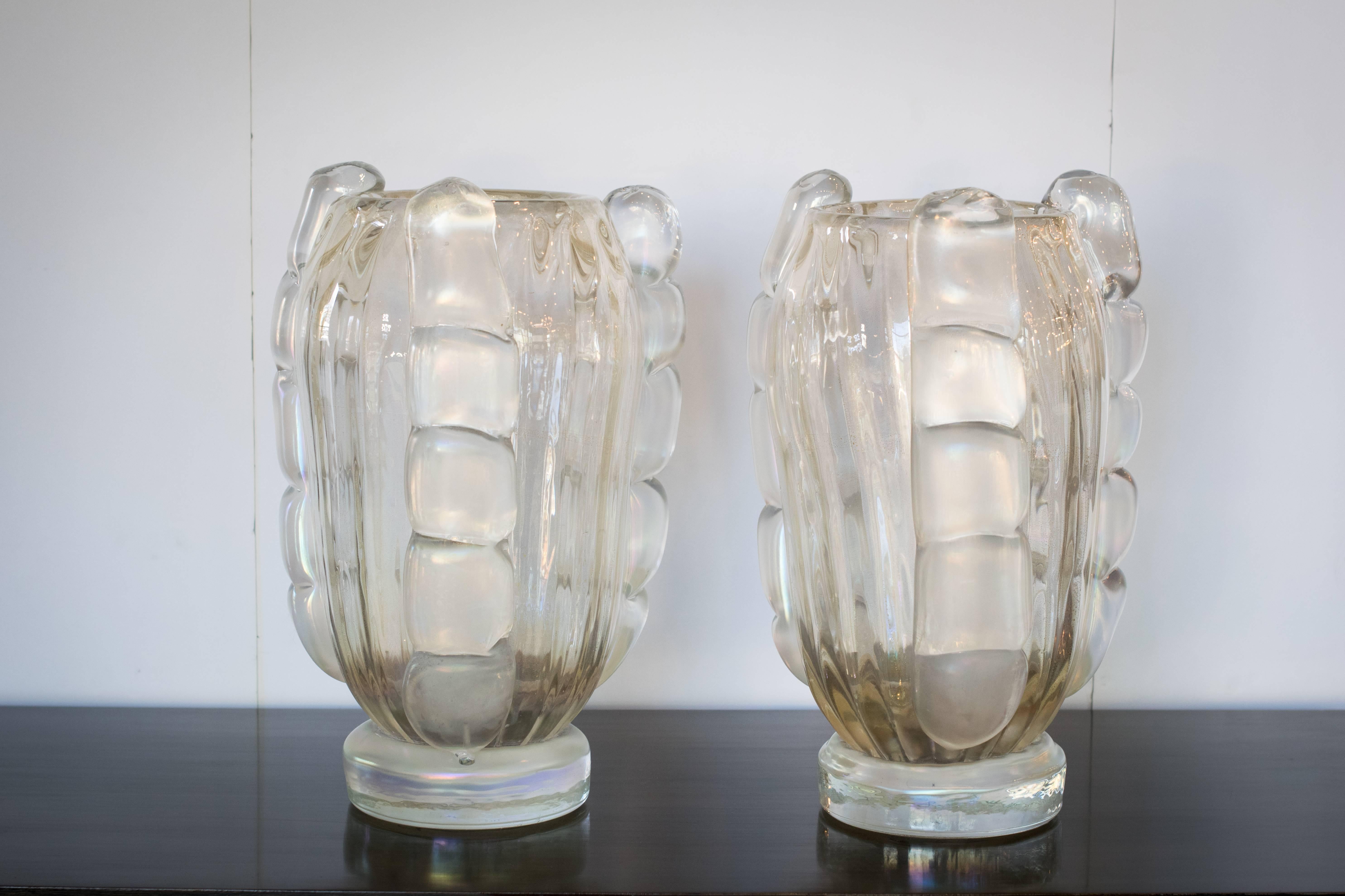Murano handblown vases of opaline glass made by prestigious Italian glassblower, Sergio Costantini. Clear glass with polvere d'oro (23-karat gold leaf flecks) is layered over white opaline glass, creating beautiful 