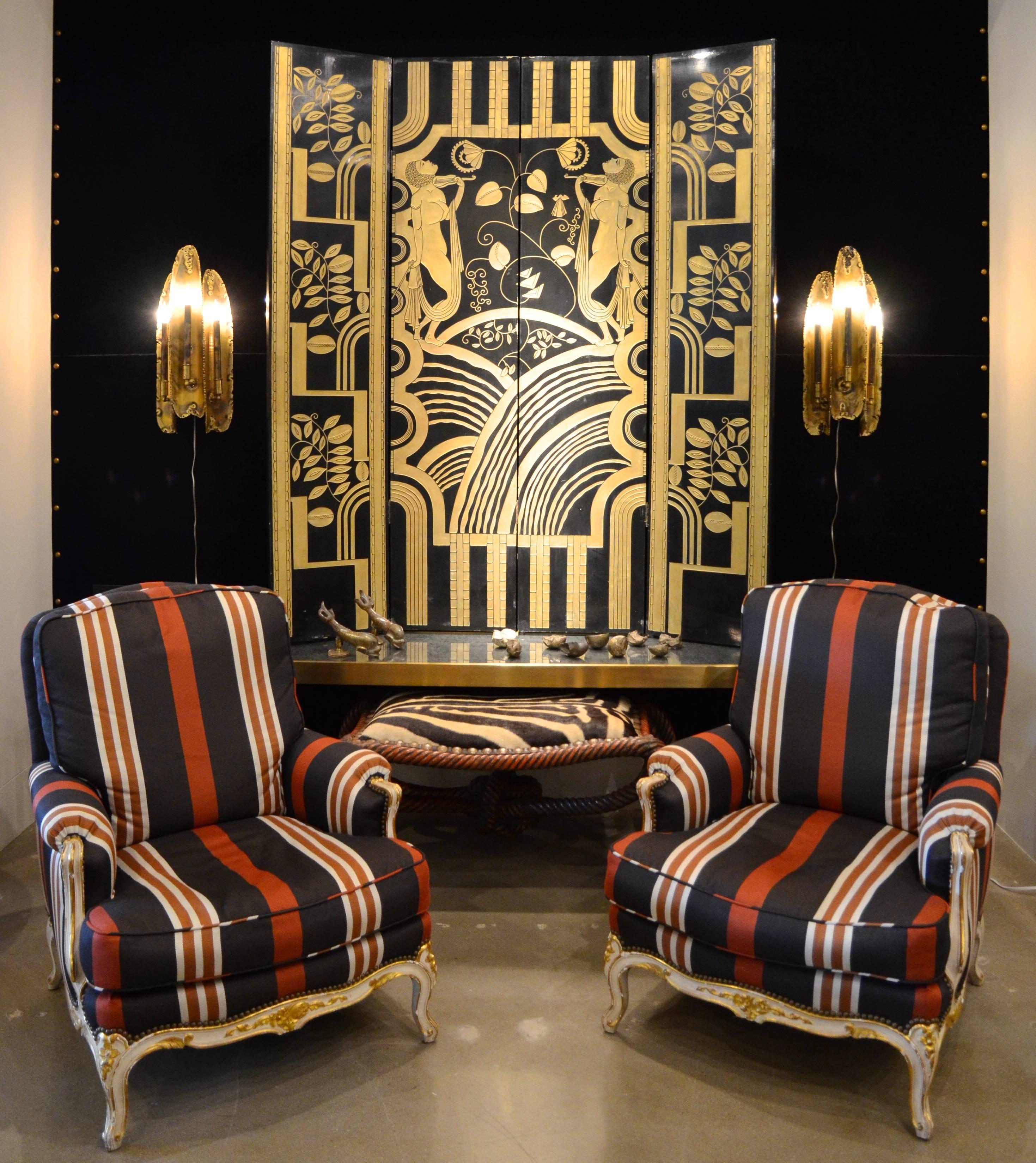 A stunning Art Deco four-fold screen of black lacquer and gold paint with bas relief Art Nouveau inspired imagery.  Reference a Fehér (attr.) screen sold at Sotheby's London in 2010 for $12,500 GBT (converted to appx. $19,500 in US dollars/2010). 
