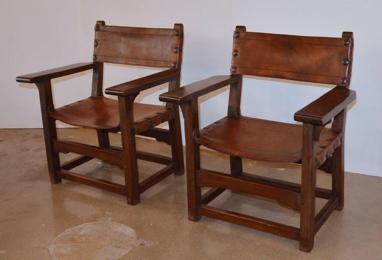Spanish Colonial Leather Arm Chairs Pair at 1stDibs