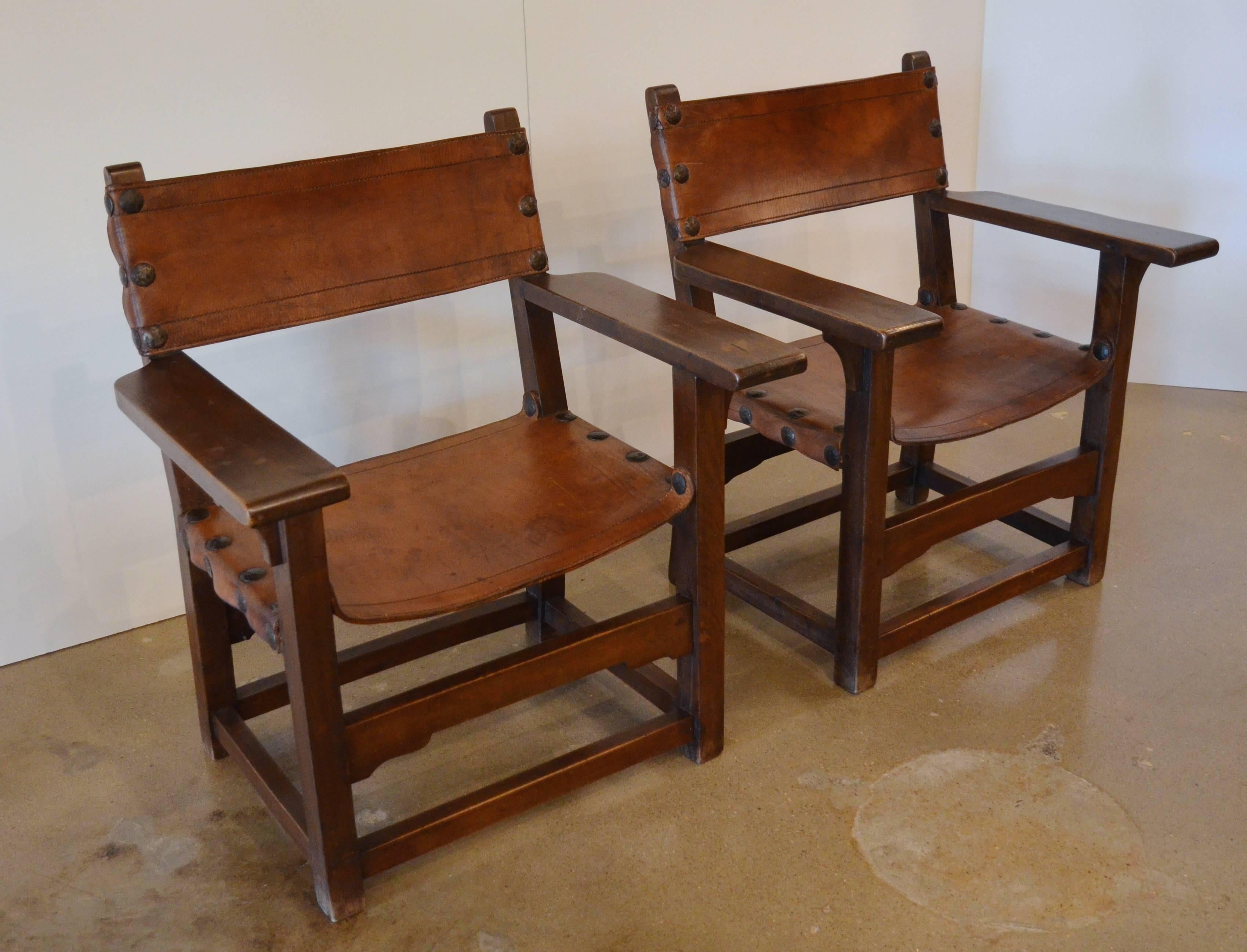 Spanish Colonial Leather Arm Chairs - Pair In Excellent Condition In Austin, TX