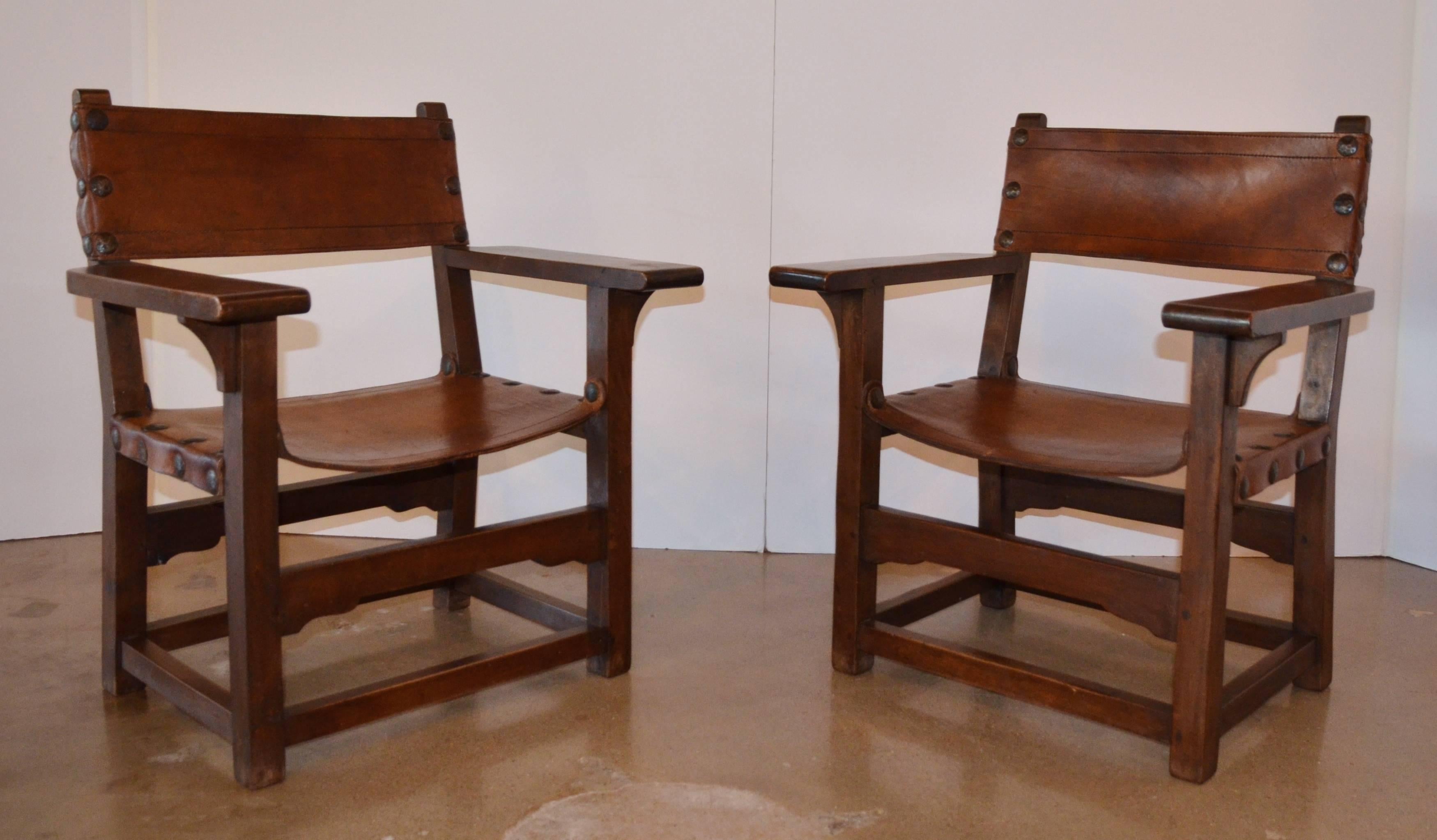 Late 19th Century Spanish Colonial Leather Arm Chairs - Pair