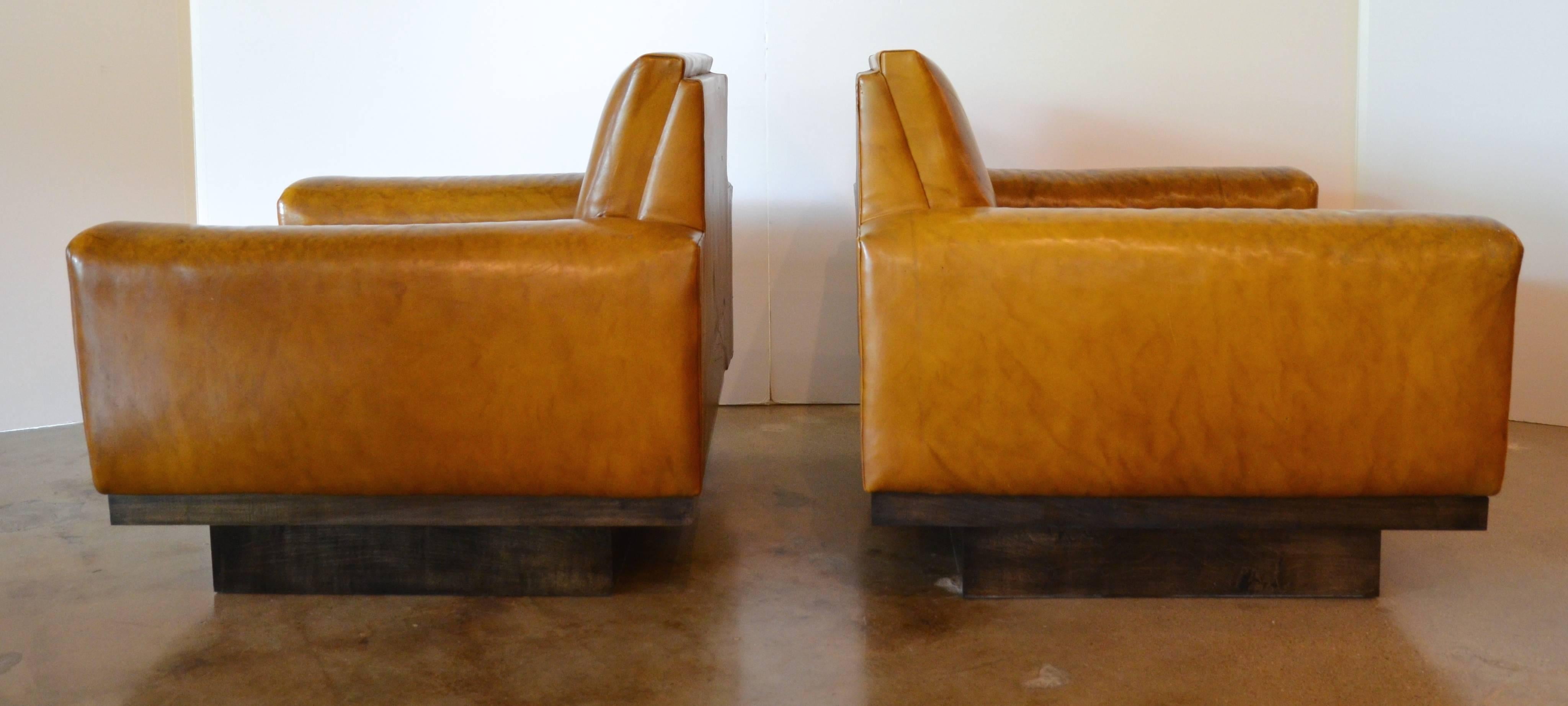Mid-Century Modern Mid-Century French Cognac Leather Club Chairs and Ottoman