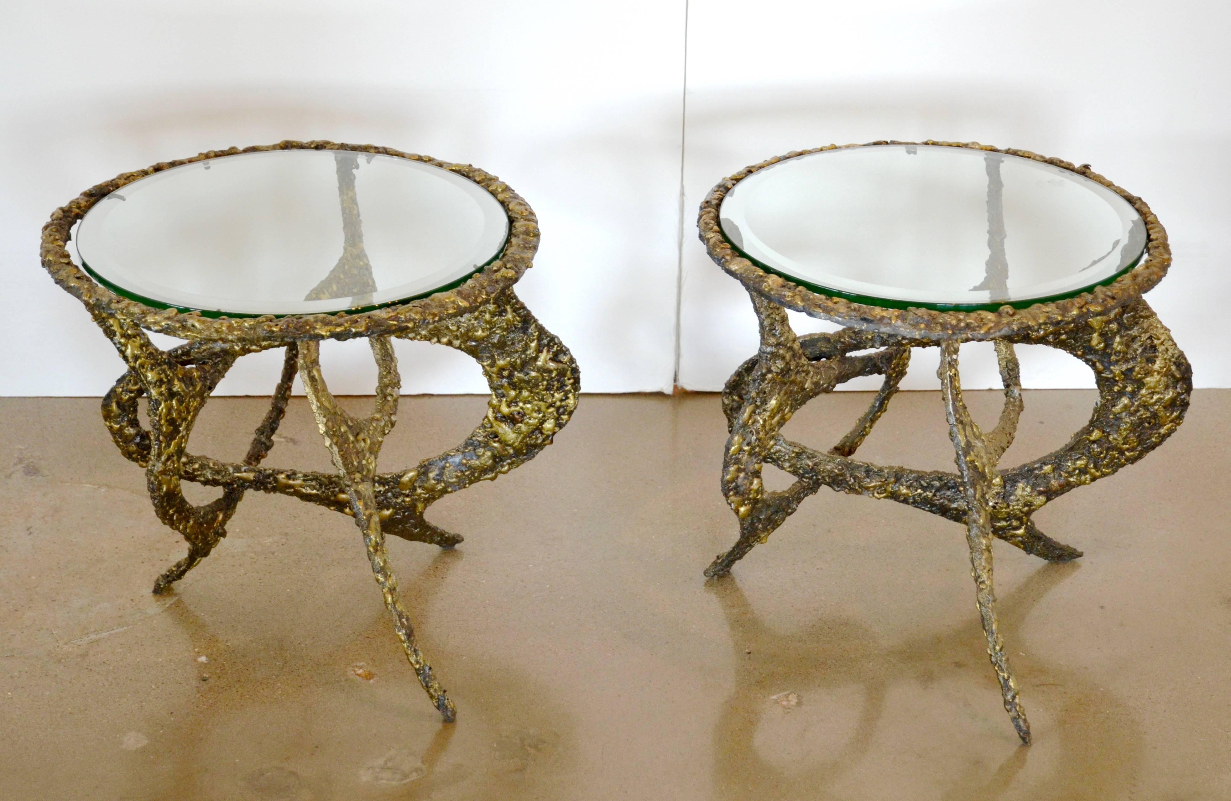 Pair of brass and glass round side tables by modern Brutalist artist, James Bearden, Des Moines, IA, 2016. Torch-cut, forged, and textured steel, fused bronze, metallic wash and glass. Signed.