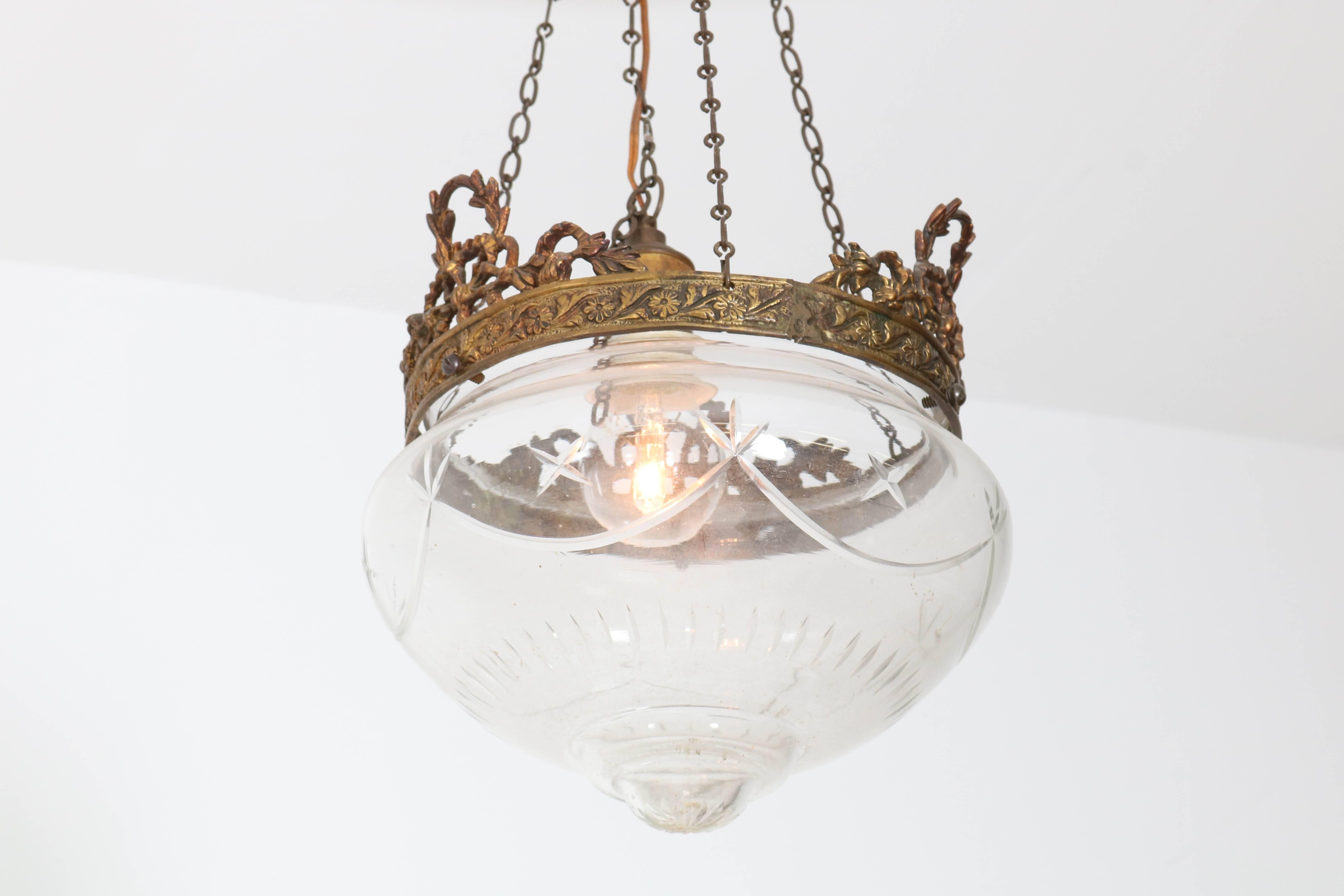 Offered by Amsterdam Modernism:
Stunning French Art Nouveau hall lamp, 1900s.
Brass frame with original beveled glass shade.
In good original condition with minor wear consistent with age and use,
preserving a beautiful patina.