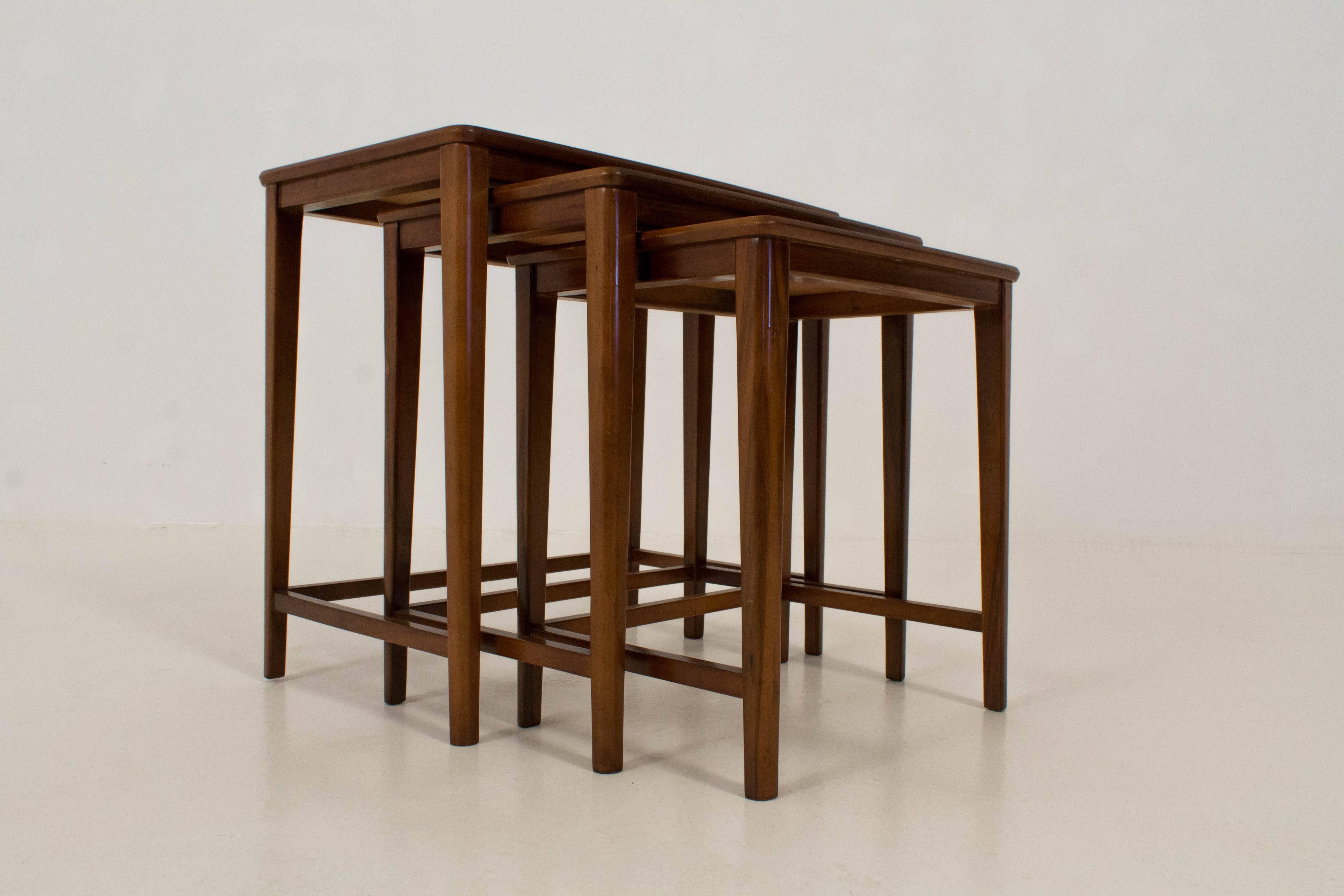 Walnut Mid-Century Modern nesting tables by A. A. Patijn for Zijlstra.
In good original condition with minor wear consistent with age and use,
preserving a beautiful patina.
Measurements: H 50 cm, W 53 cm, D 34 cm.
H 46 cm, W 46 cm, D 32 cm.
H